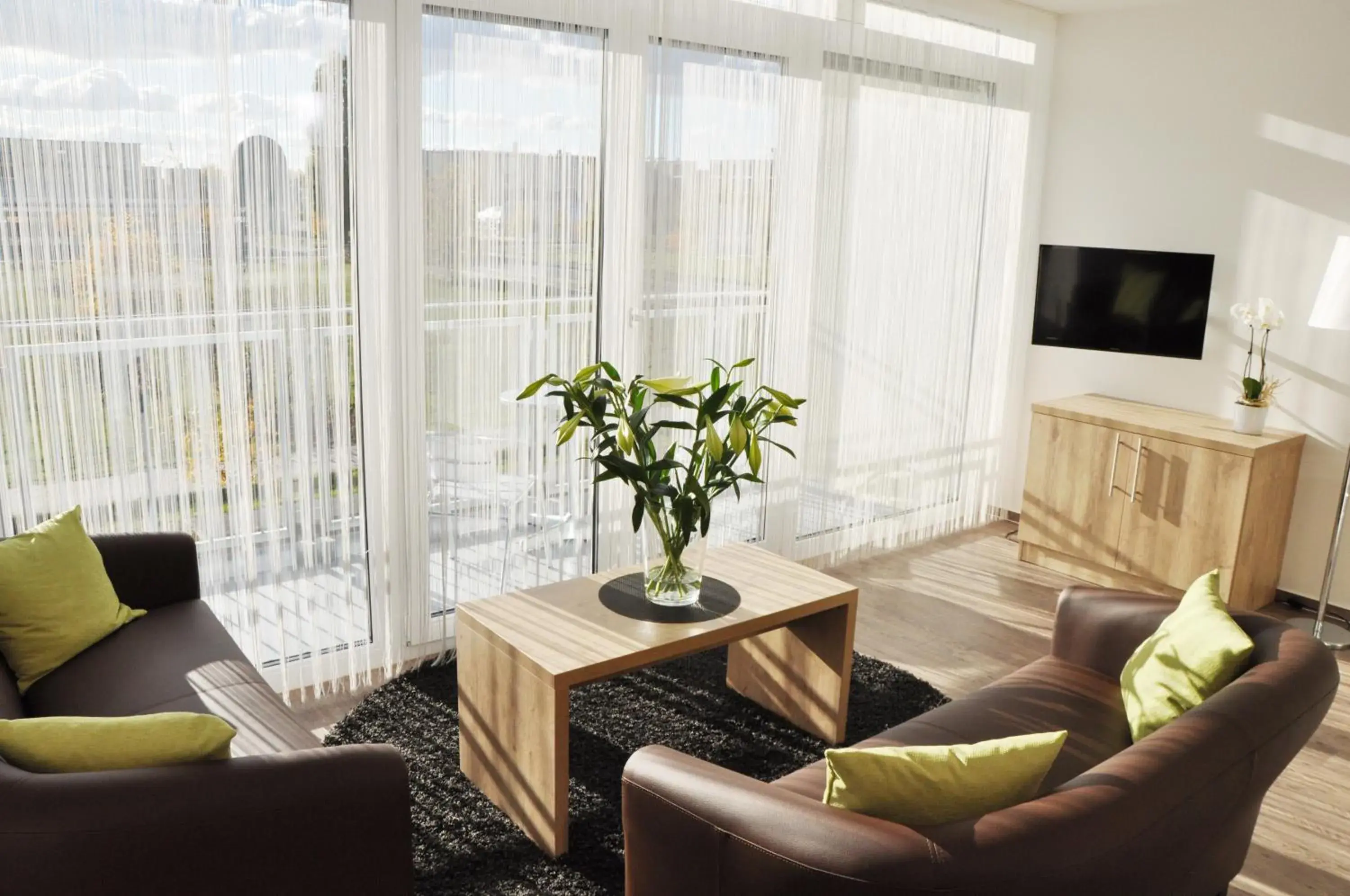Living room in ADAPT APARTMENTS BERLIN - Adlershof Living room in ADAPT APARTMENTS BERLIN - Adlershof