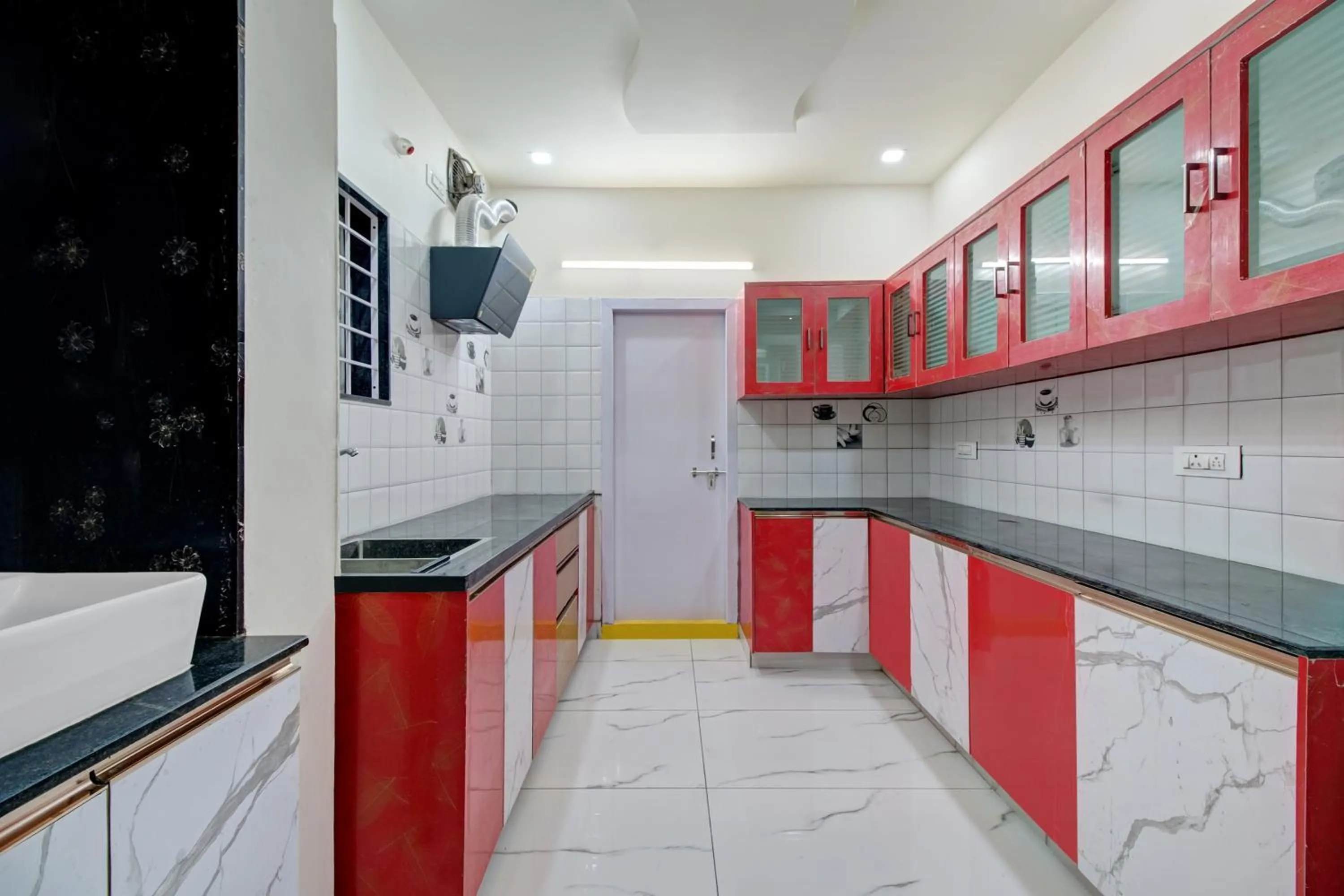 Kitchen or kitchenette in Super Hotel O Amaravathi Road Annapurna Nagar