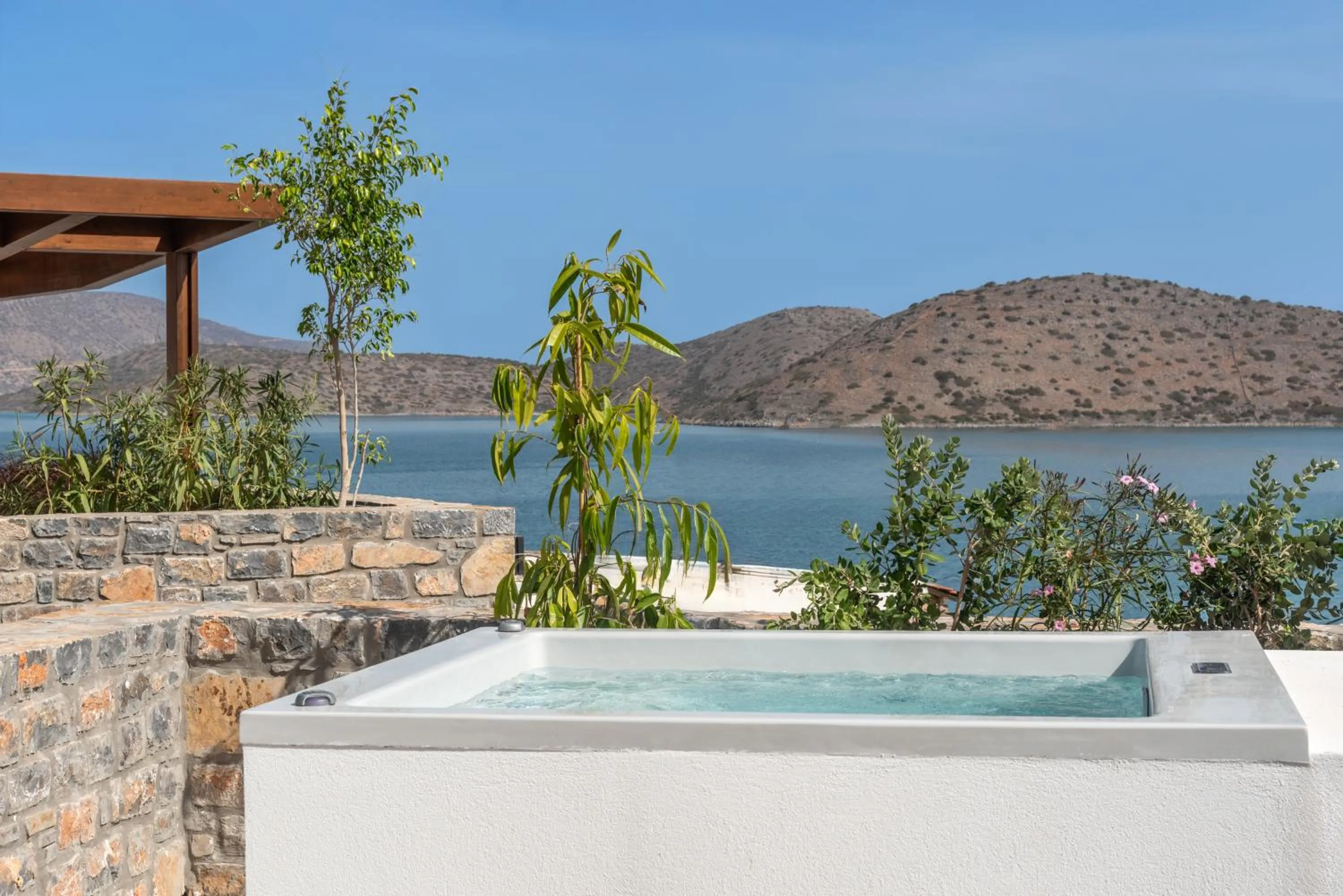 Junior Suite with Outdoor Jetted Tub and Sea View in Elounda Stories Boutique Hotel