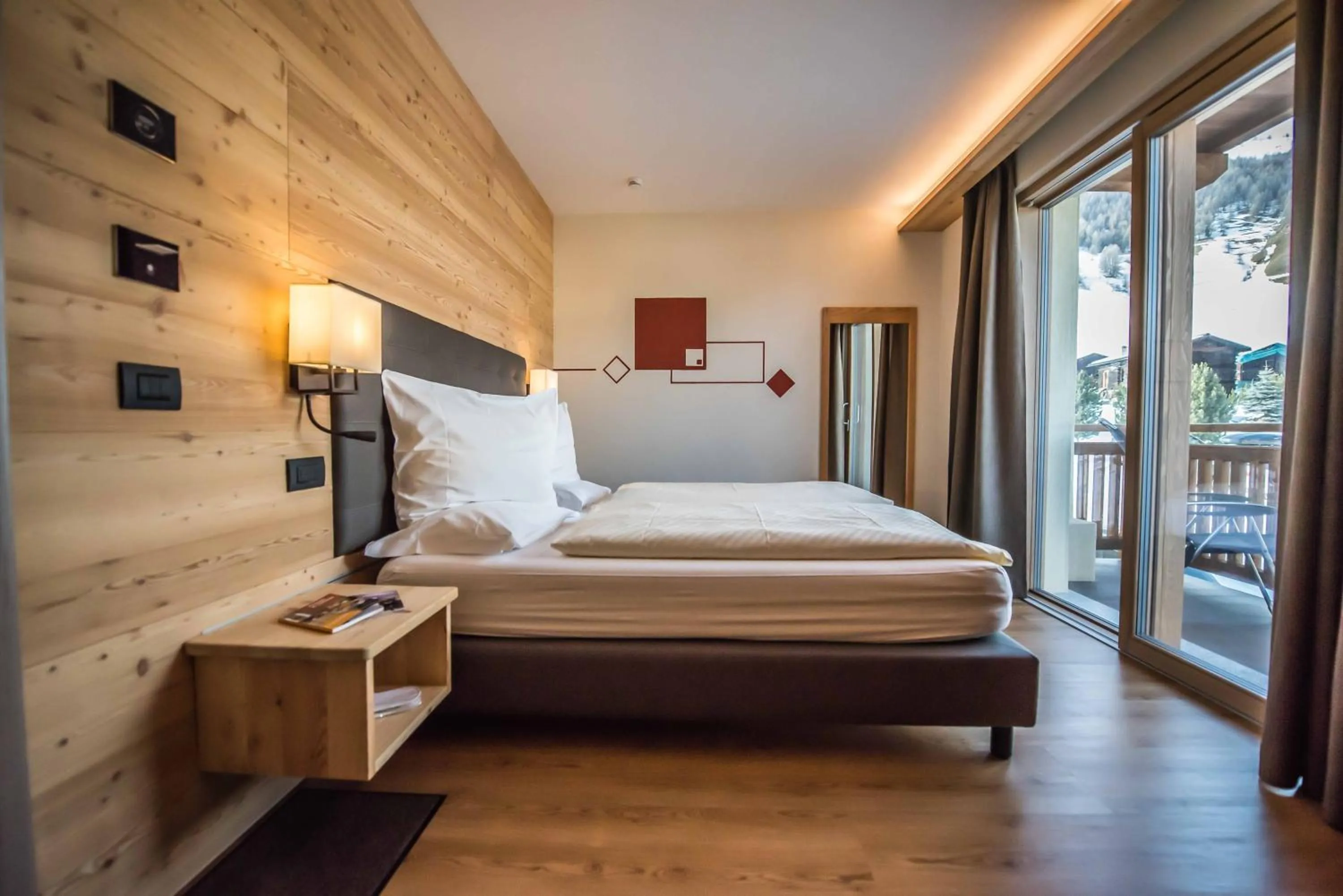 Bed in Hotel Le Alpi