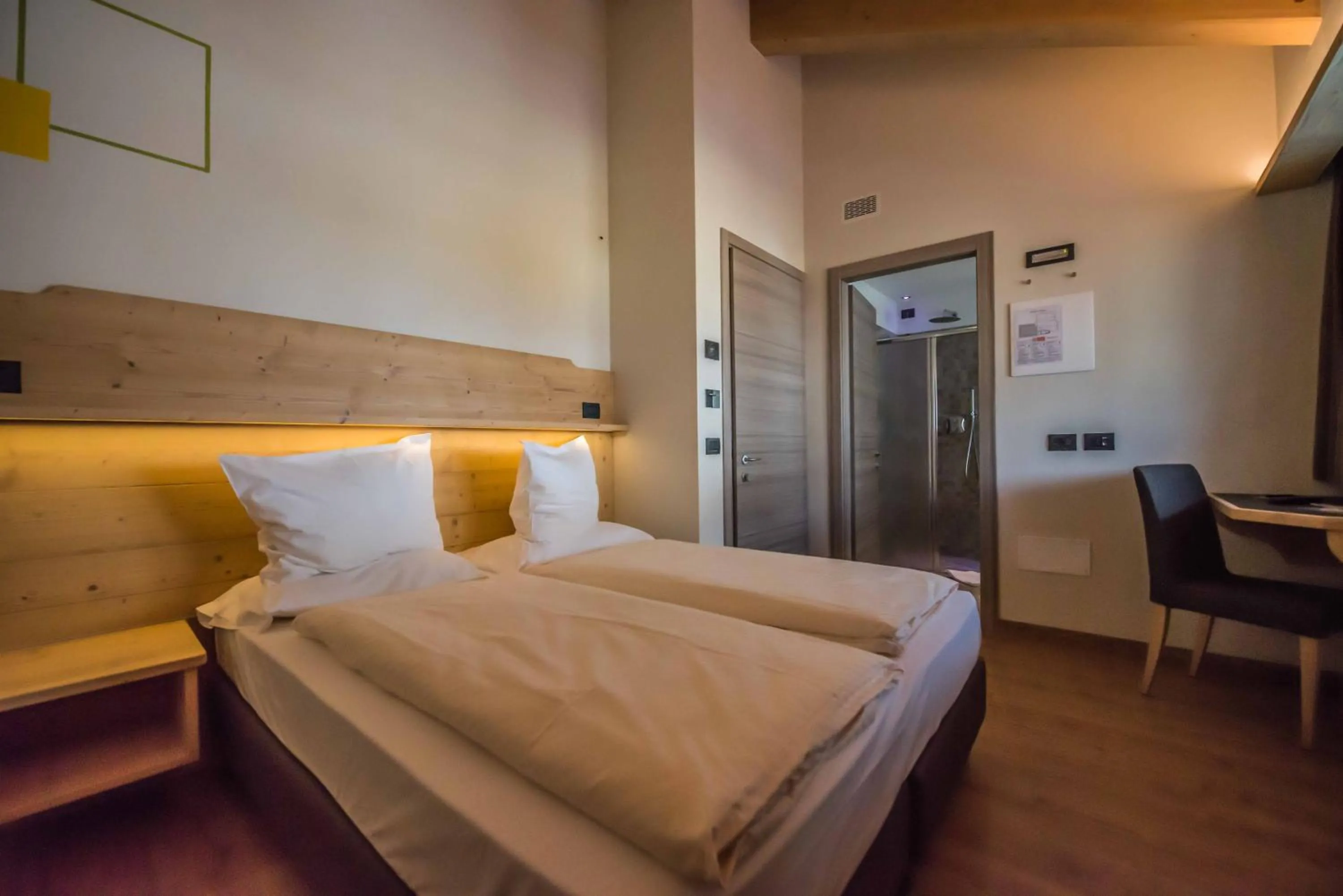 Bed in Hotel Le Alpi