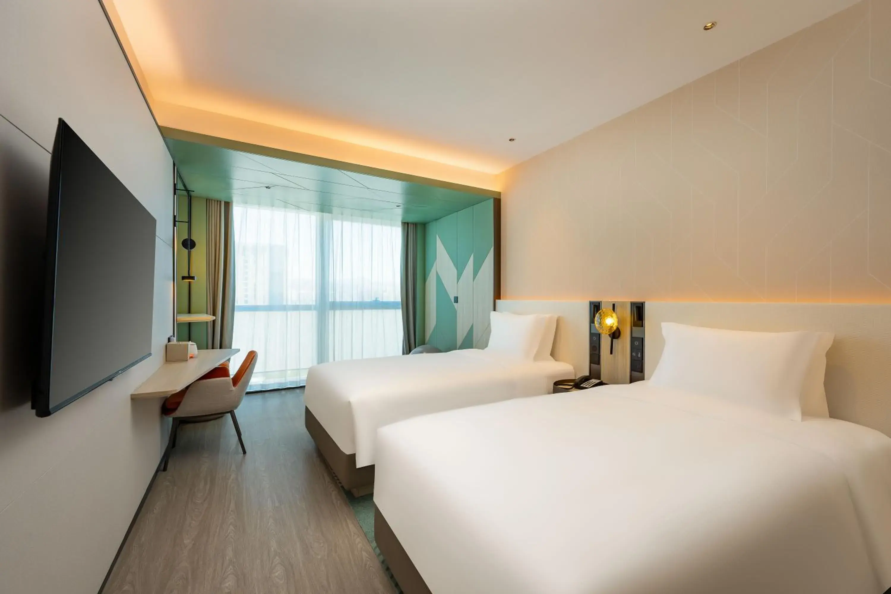 Bed in EVEN Hotel Qingdao Laoshan - an IHG Hotel Bed in EVEN Hotel Qingdao Laoshan - an IHG Hotel