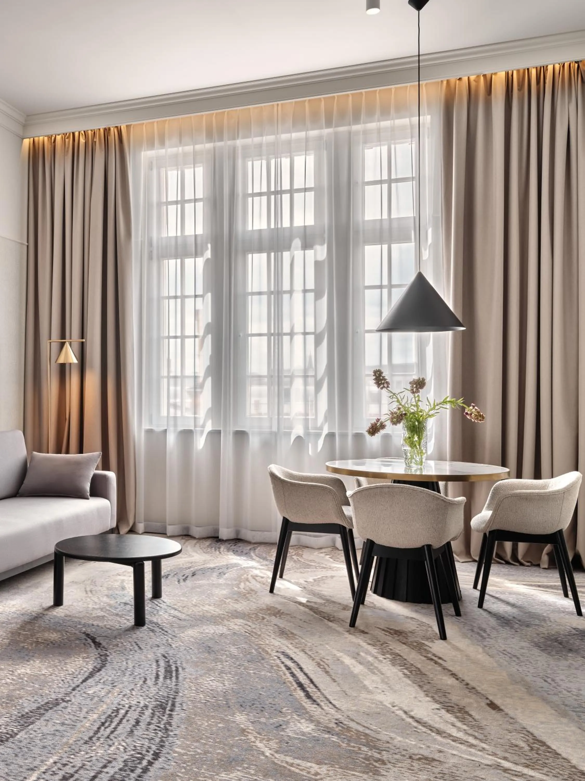 Living room in Mövenpick Grand Hotel Wroclaw