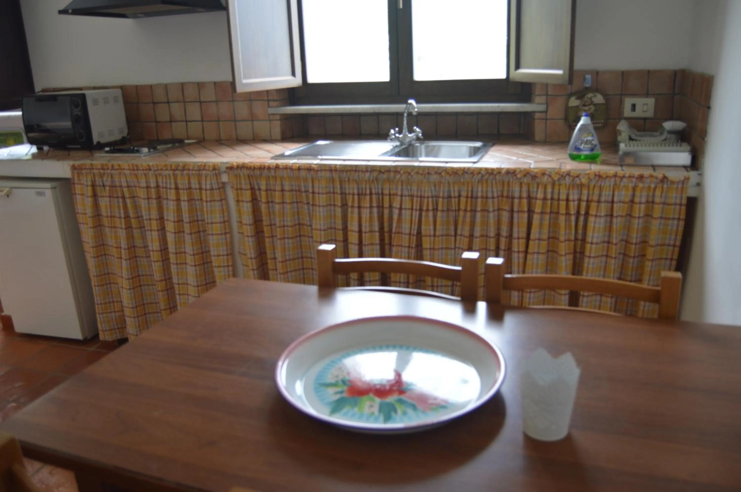 Kitchen or kitchenette in Casa Sarticola