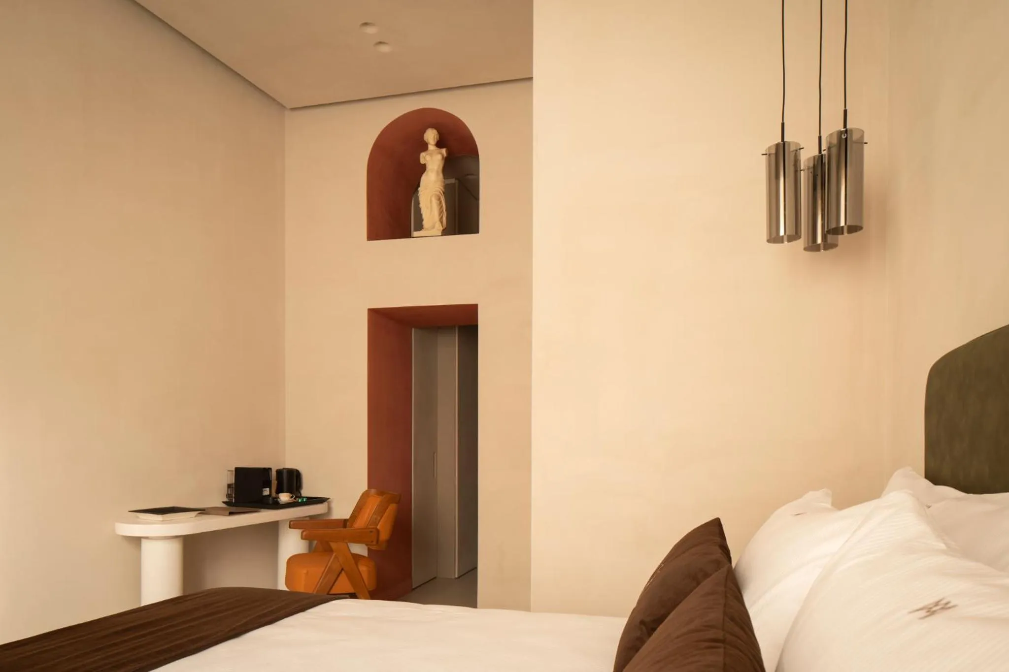 Bed in Demetra Luxury Suites