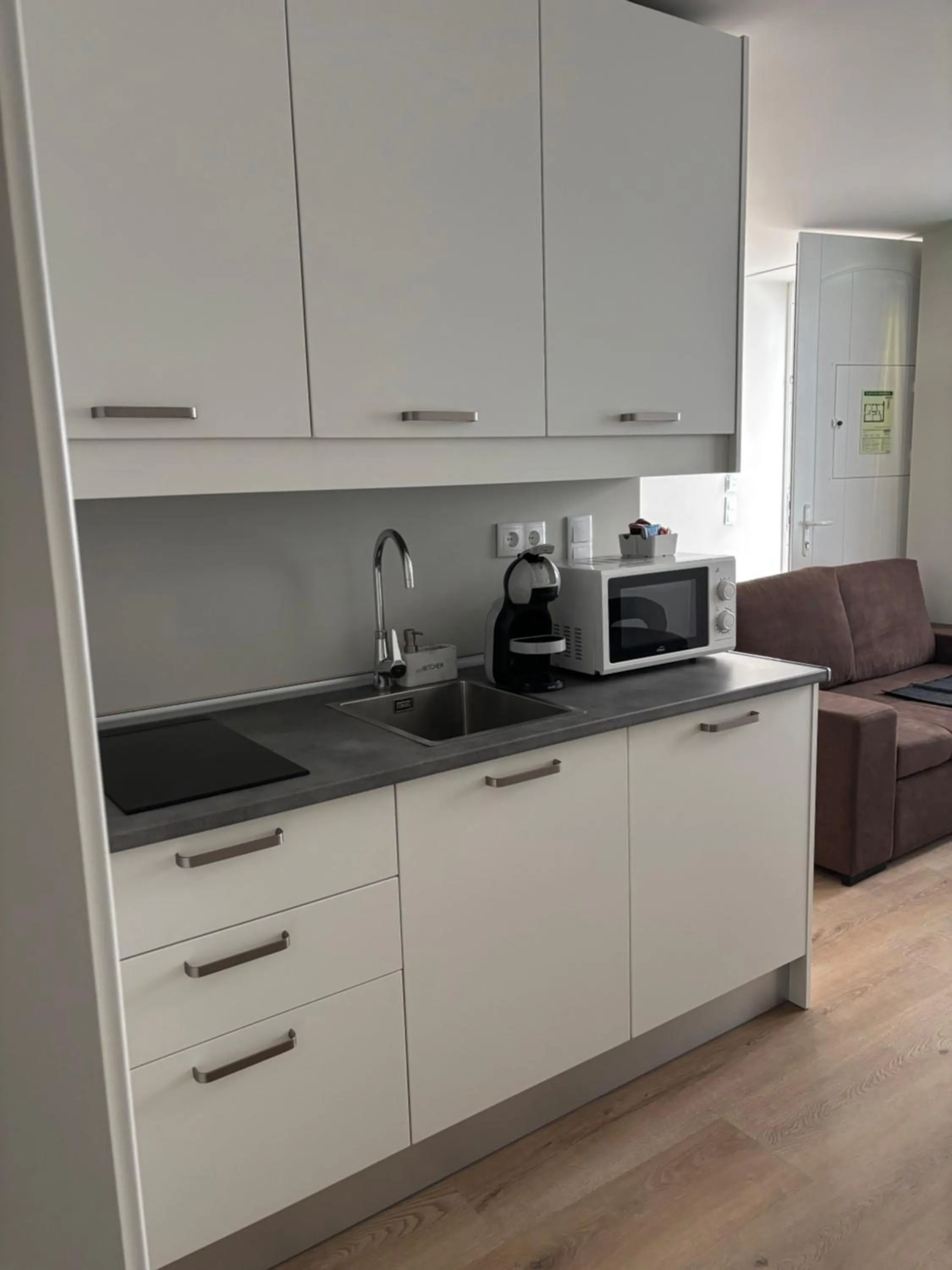 Kitchen or kitchenette in Azores Book Hotel