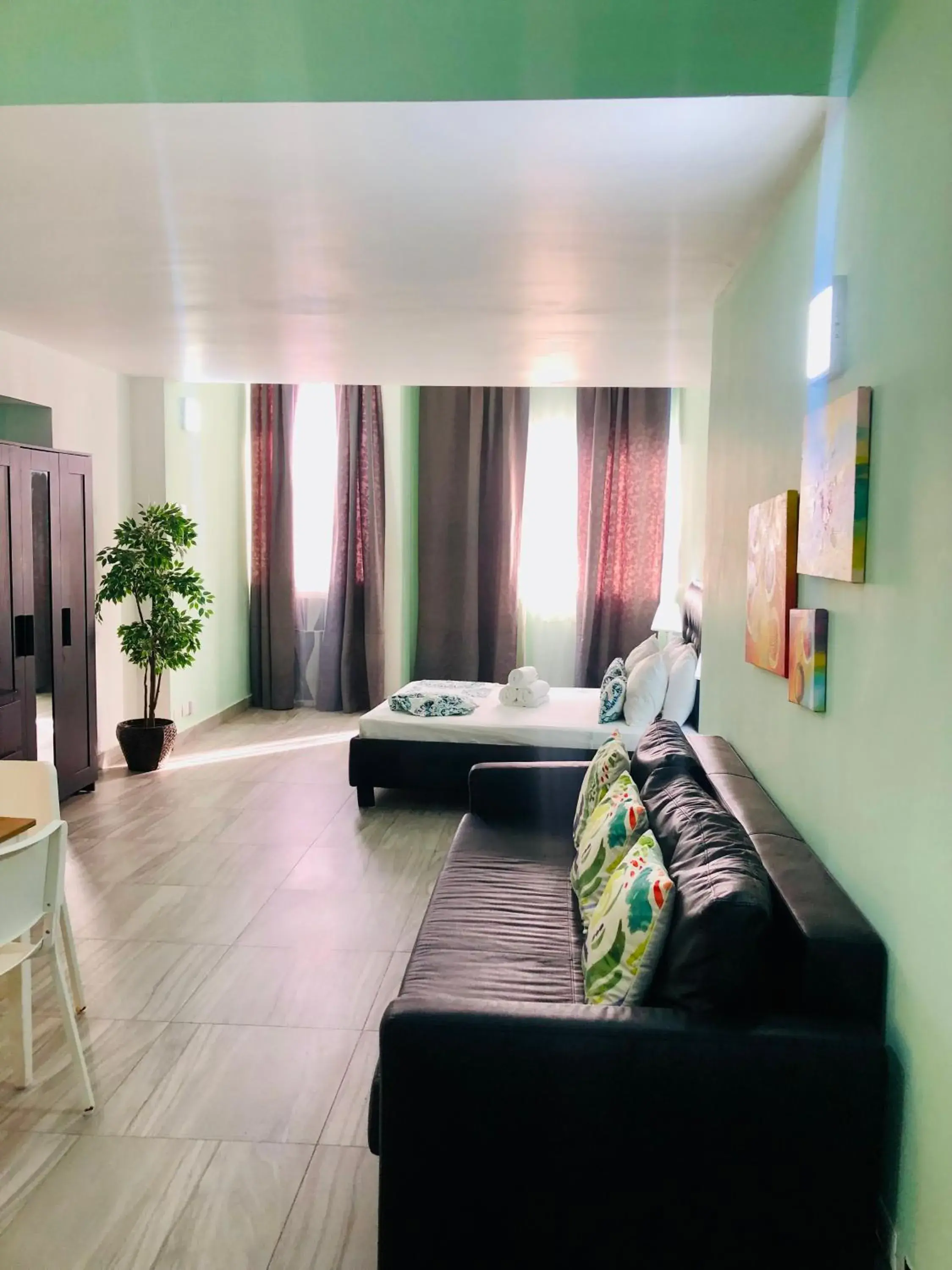 Bed in Ducassi Rooftop Pool Suites Beach Club and SPA Bed in Ducassi Rooftop Pool Suites Beach Club and SPA