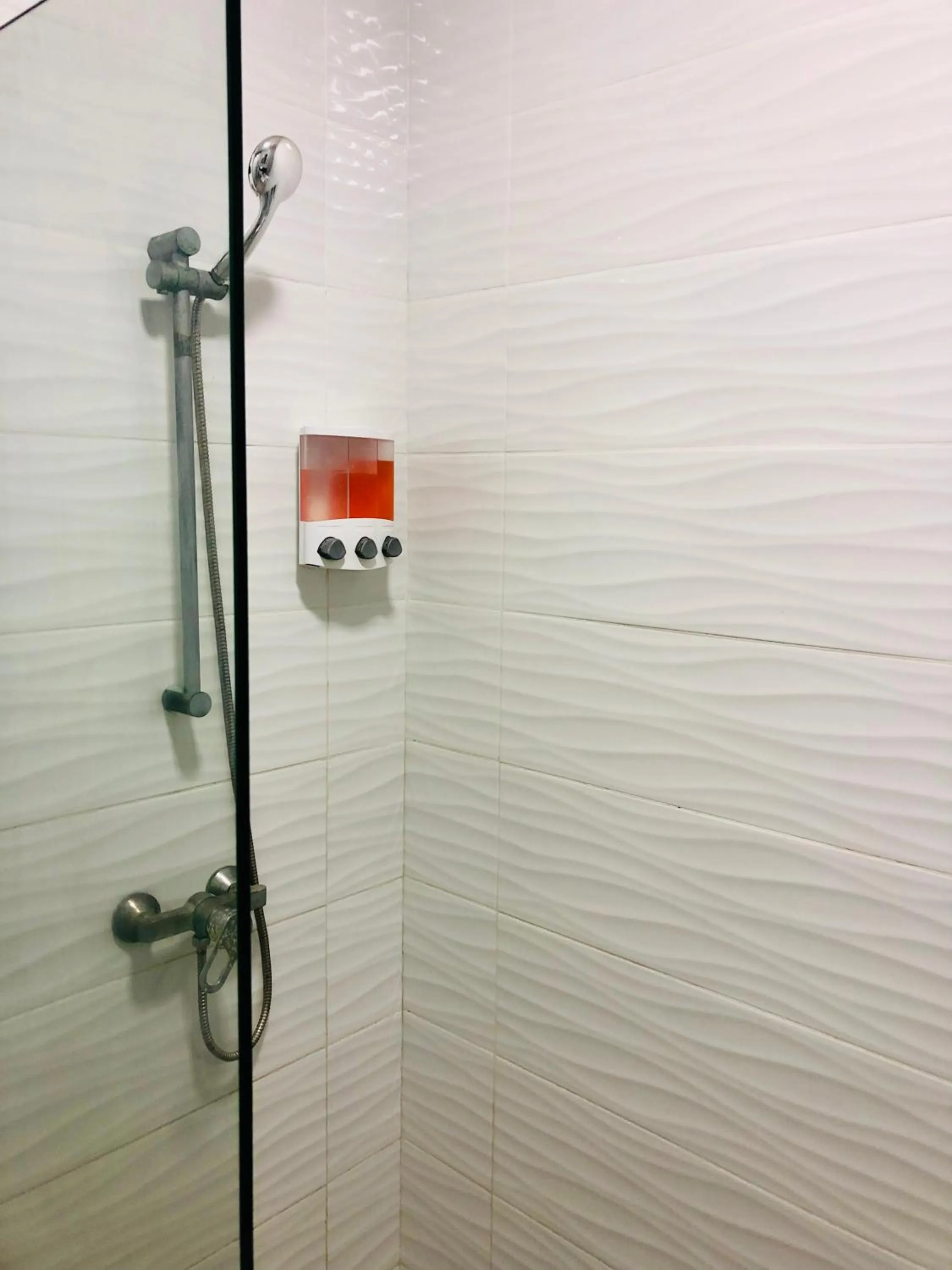 Bathroom in Ducassi Rooftop Pool Suites Beach Club and SPA