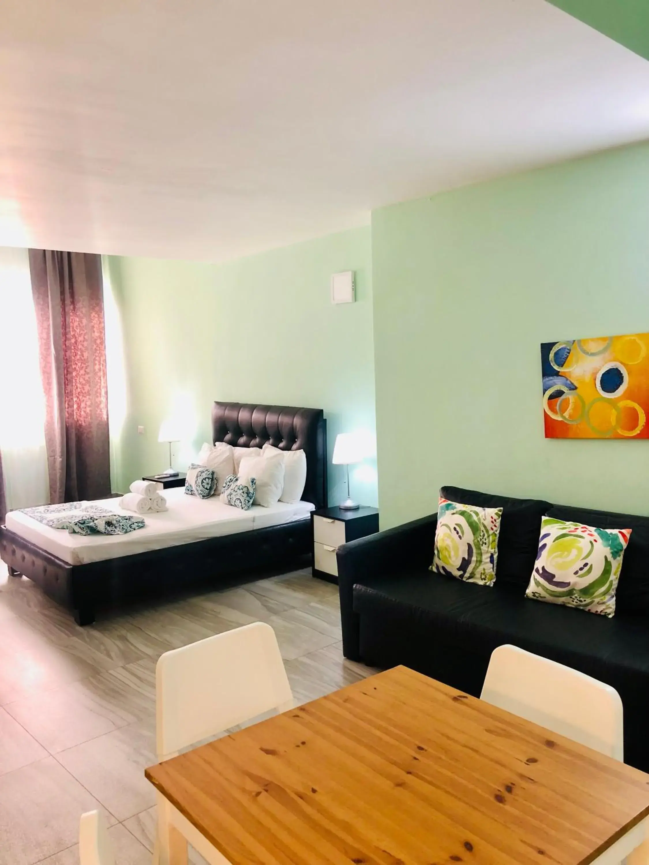 Bed in Ducassi Rooftop Pool Suites Beach Club and SPA Bed in Ducassi Rooftop Pool Suites Beach Club and SPA