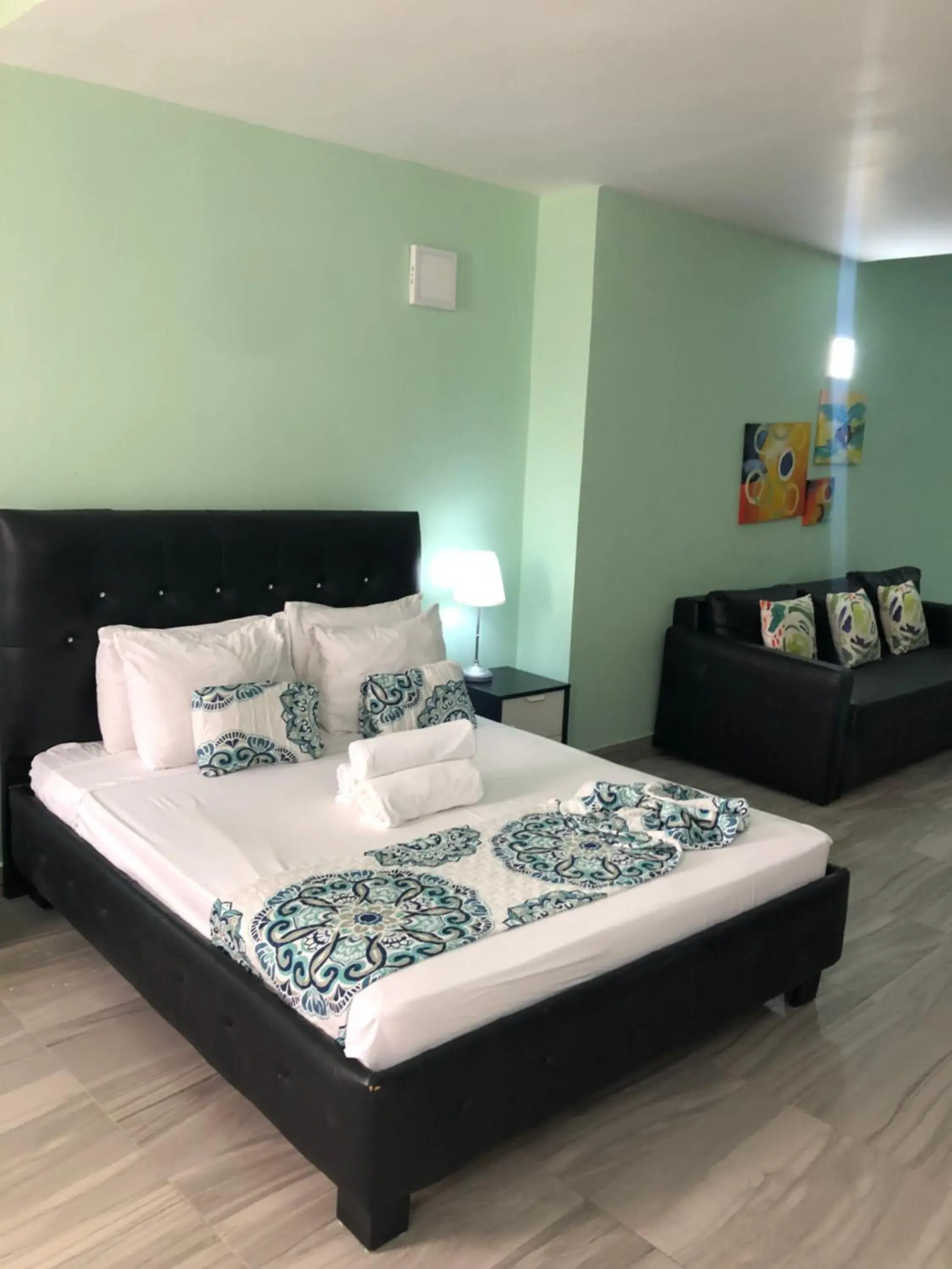 Bed in Ducassi Rooftop Pool Suites Beach Club and SPA Bed in Ducassi Rooftop Pool Suites Beach Club and SPA