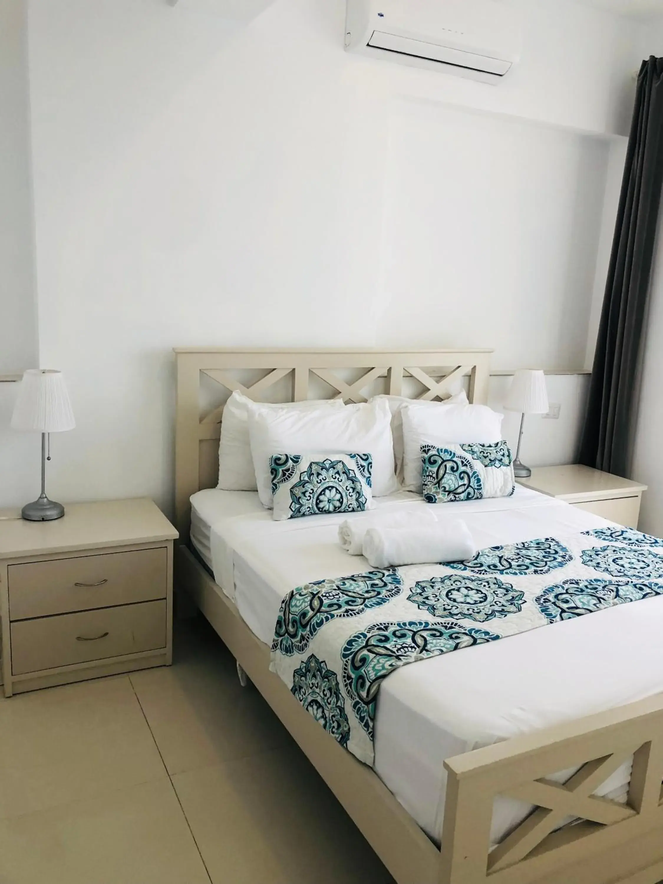 Bed in Ducassi Rooftop Pool Suites Beach Club and SPA Bed in Ducassi Rooftop Pool Suites Beach Club and SPA