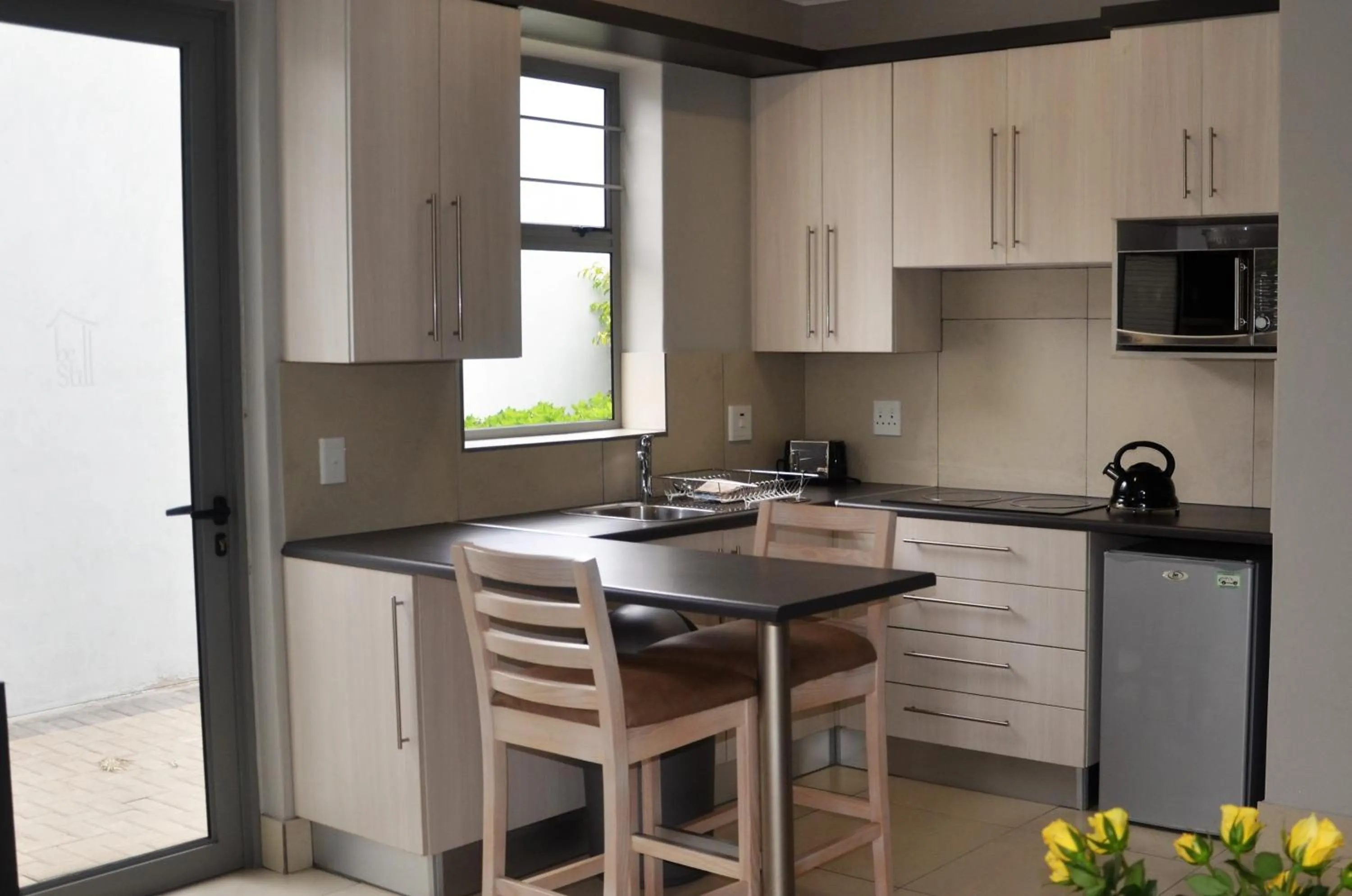 Kitchen or kitchenette in Be-Still Accommodation