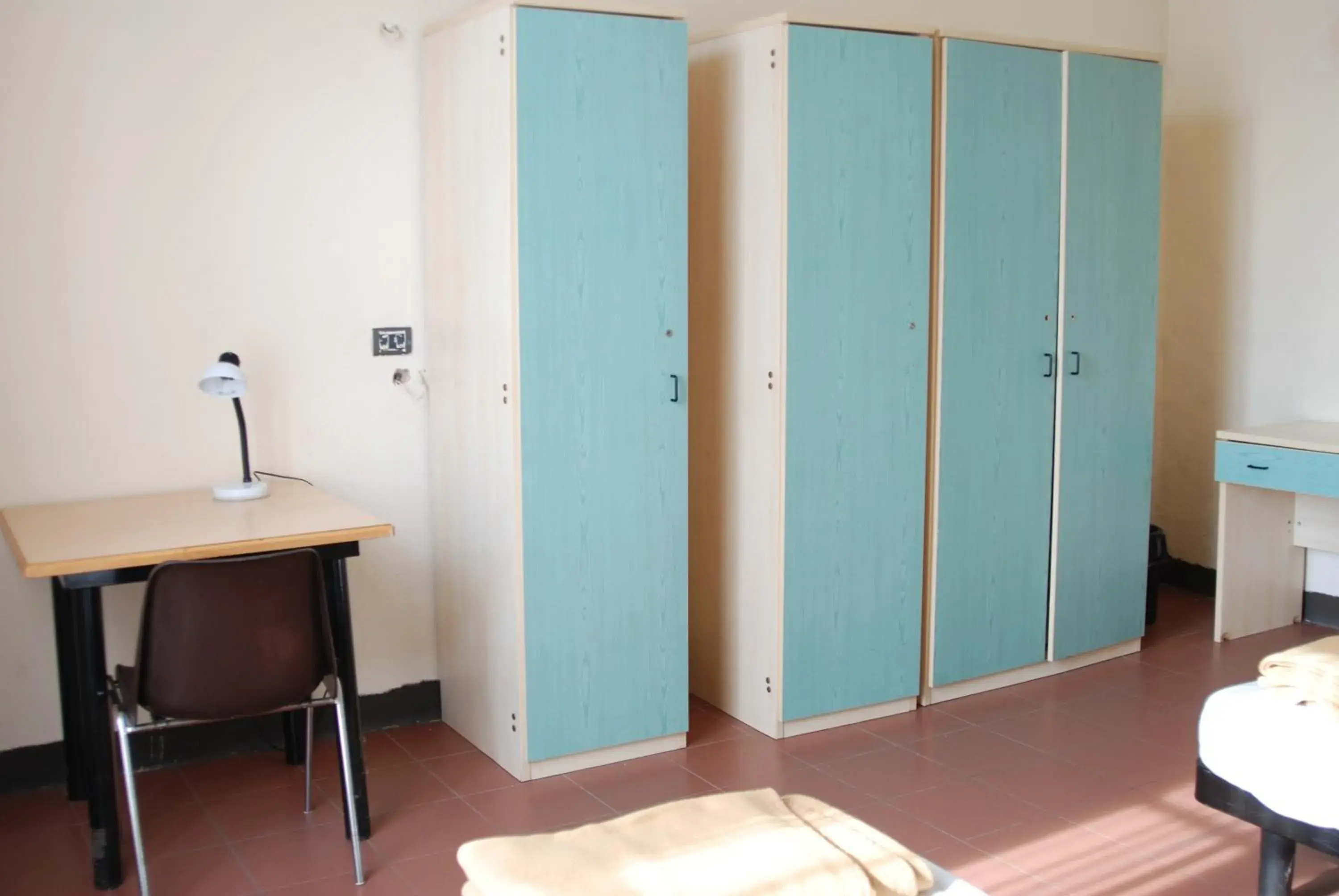 Quadruple Room with Shared Bathroom - single occupancy in Il Chiostro Hostel and Hotel Quadruple Room with Shared Bathroom - single occupancy in Il Chiostro Hostel and Hotel