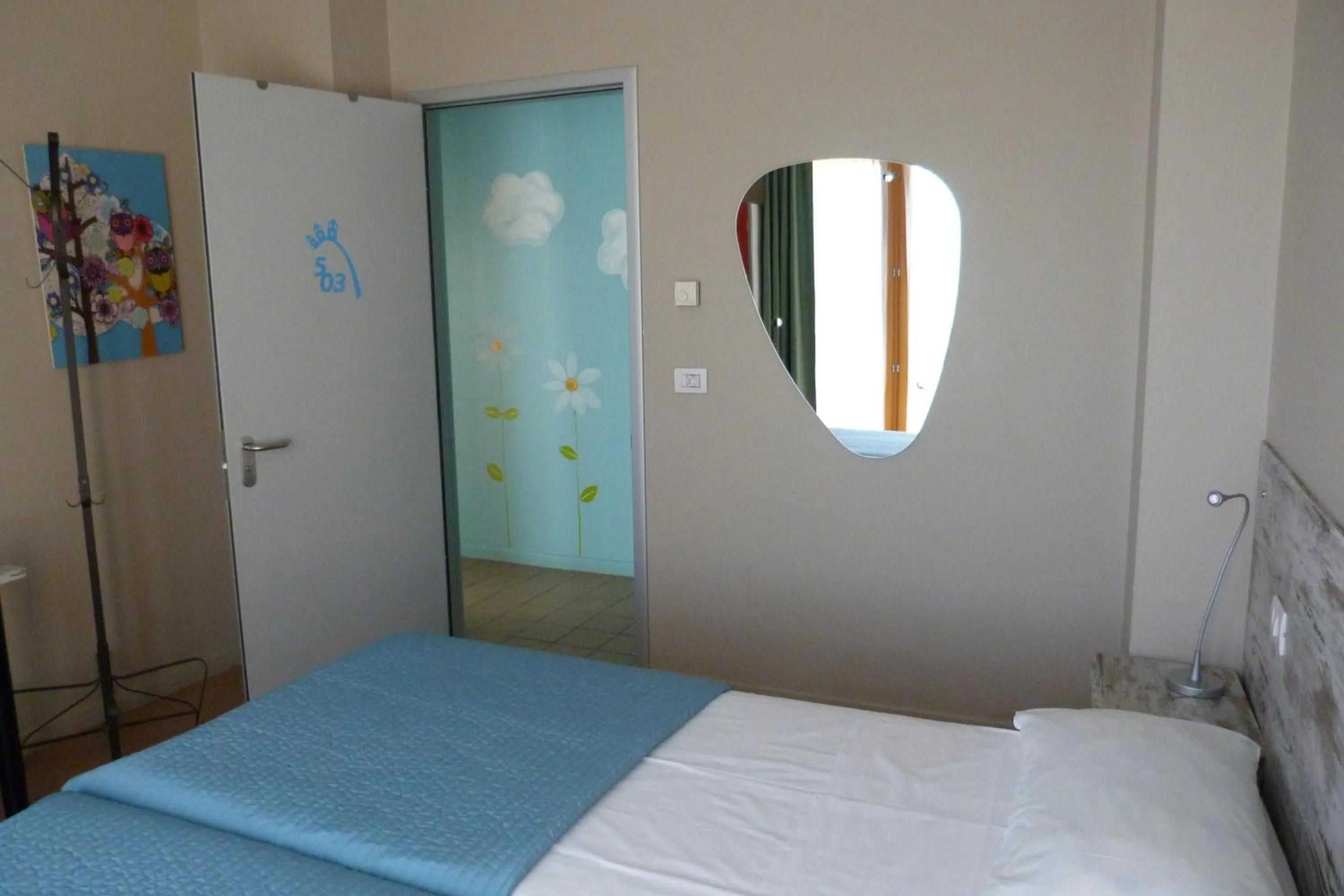 Decorative detail, Bed in Ostello Torino