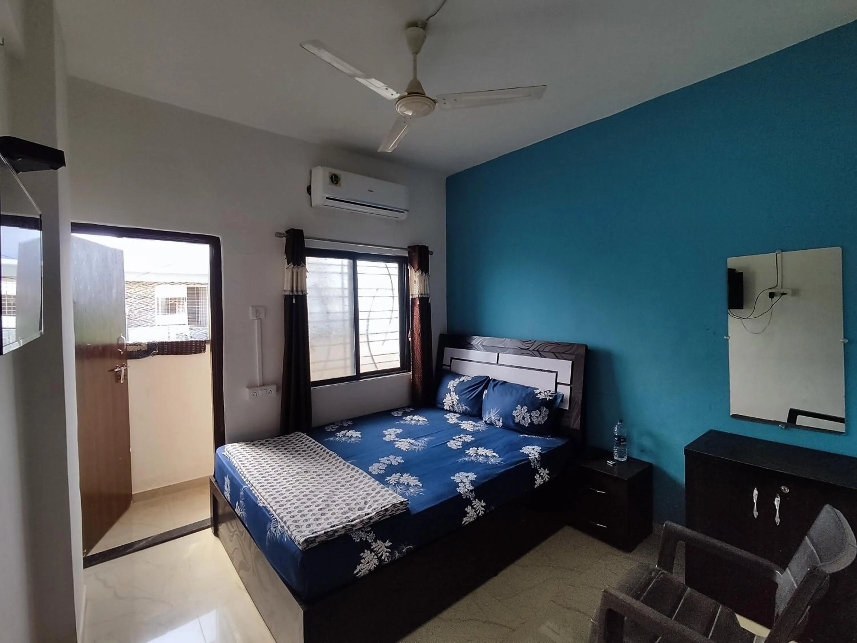 Bed in Ambient Homestay by NESTEASY