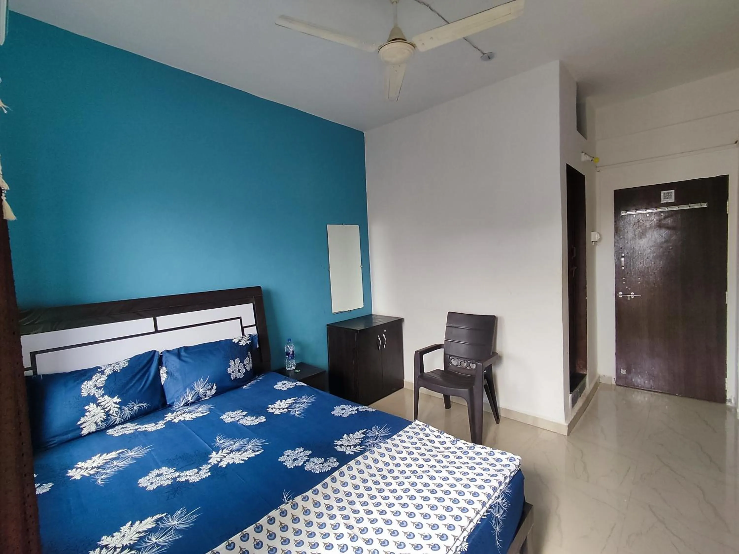 Bed in Ambient Homestay by NESTEASY