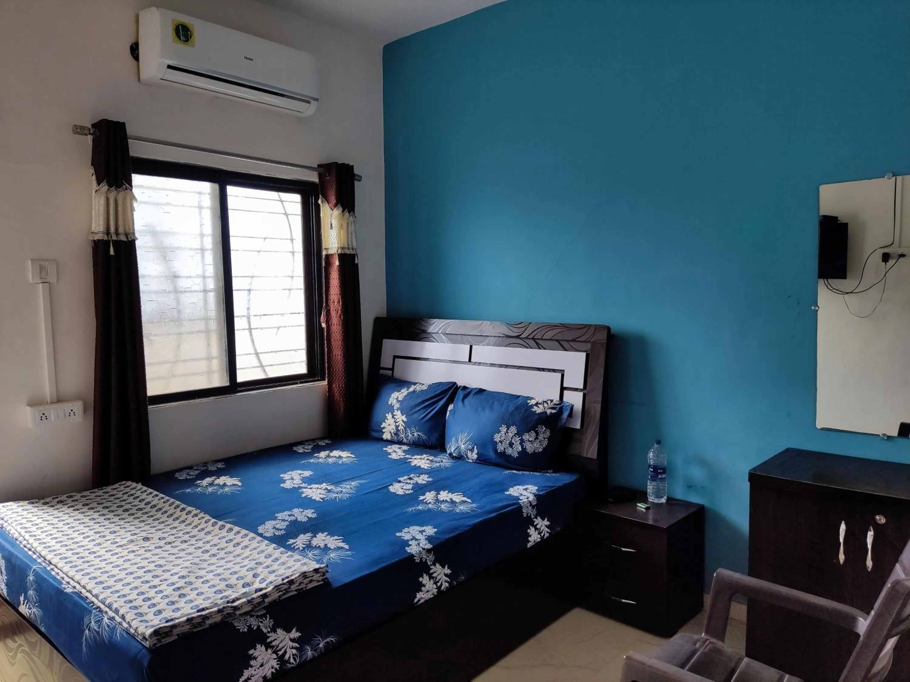 Bed in Ambient Homestay by NESTEASY