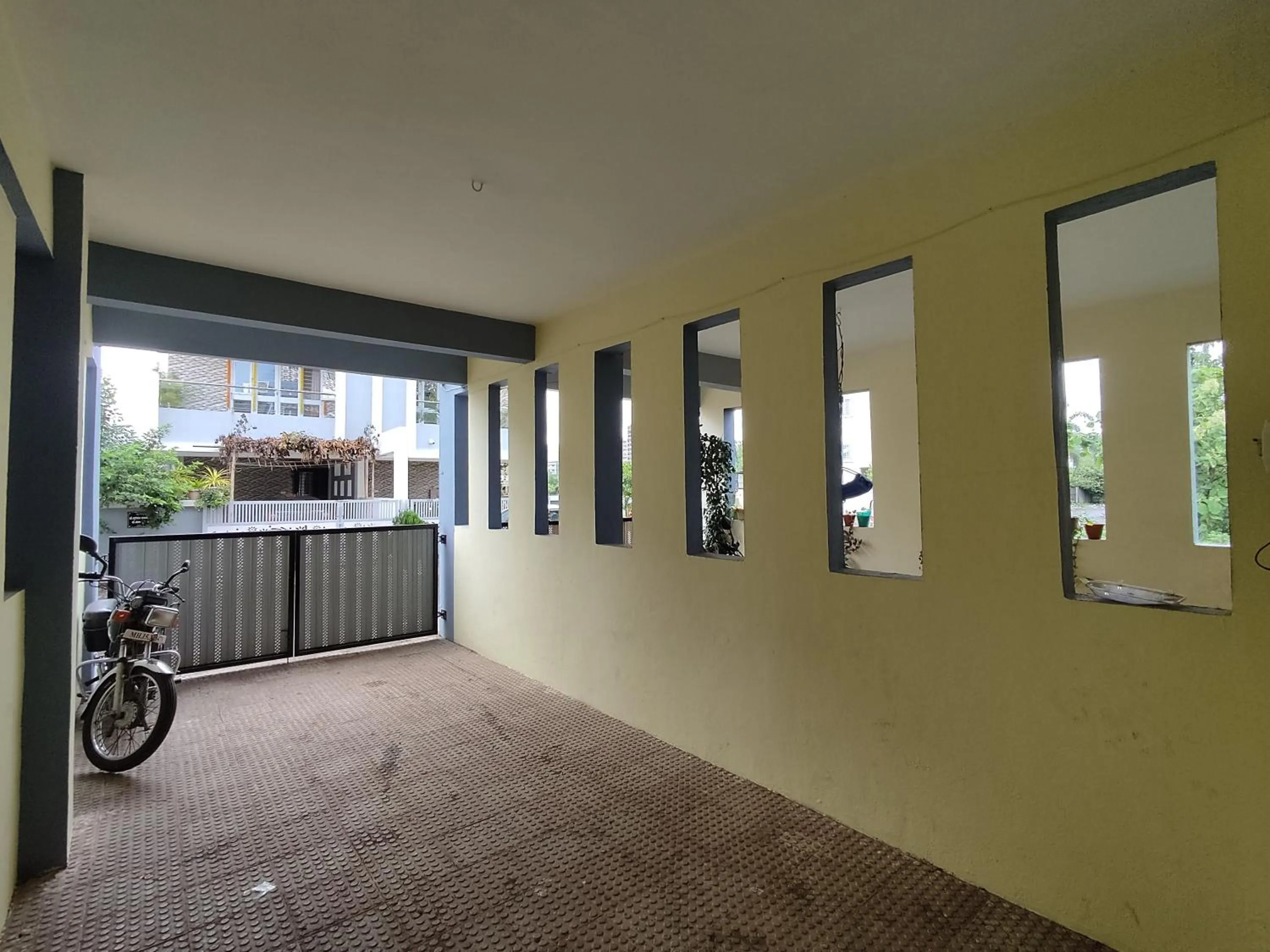 Parking in Ambient Homestay by NESTEASY