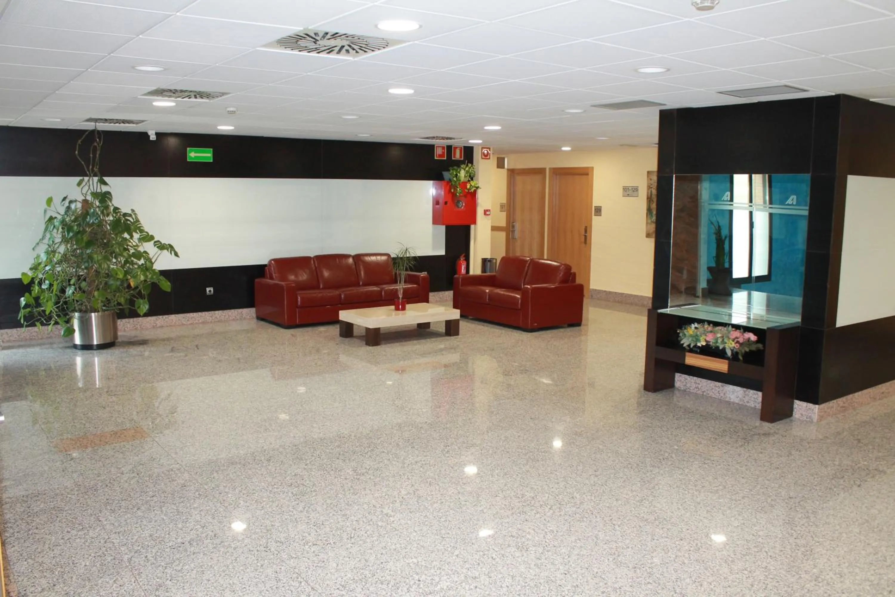 Communal lounge/ TV room in Andamur San Román