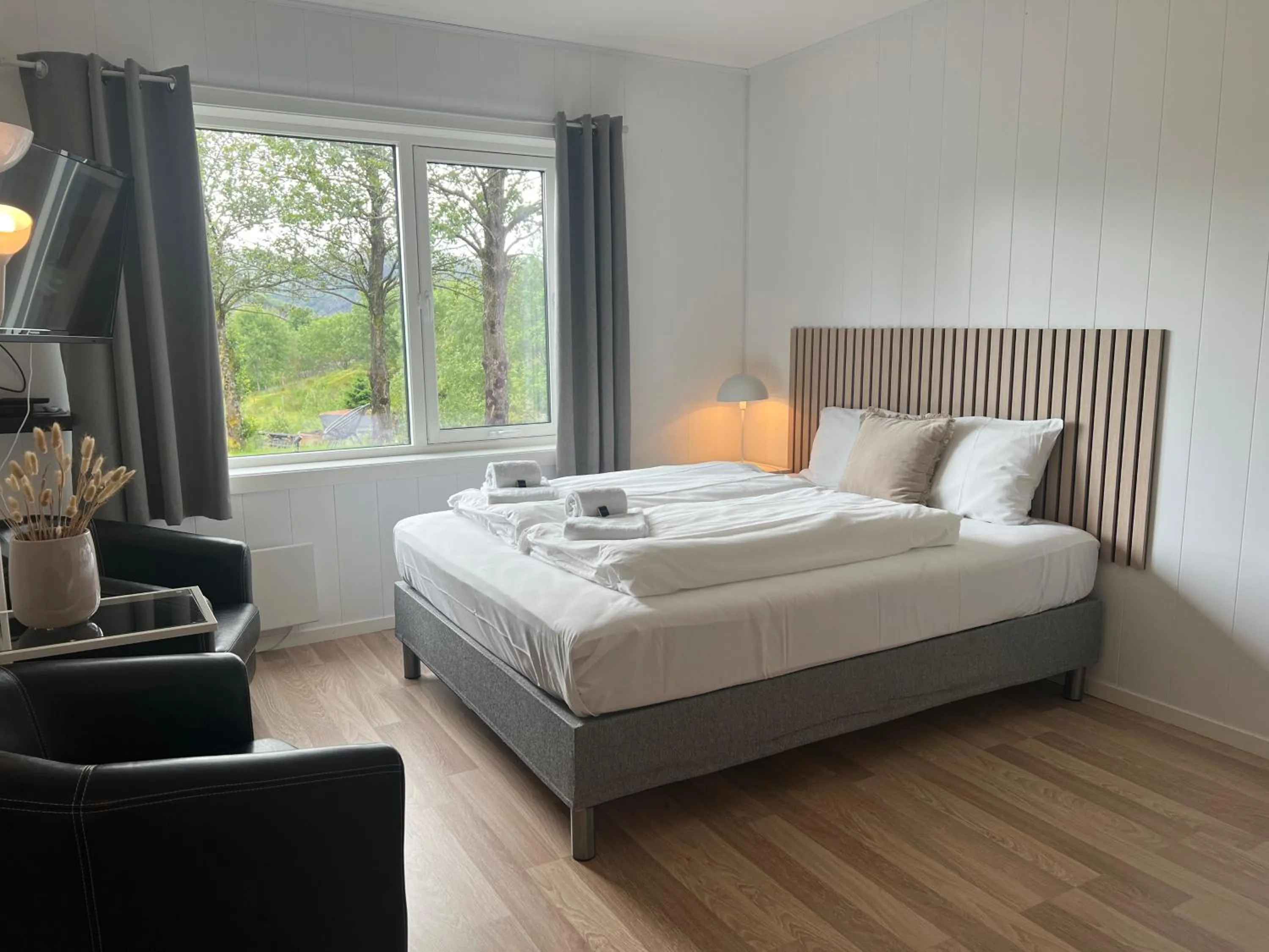 Bed in Selvbetjent leilighetshotell på Ålgård