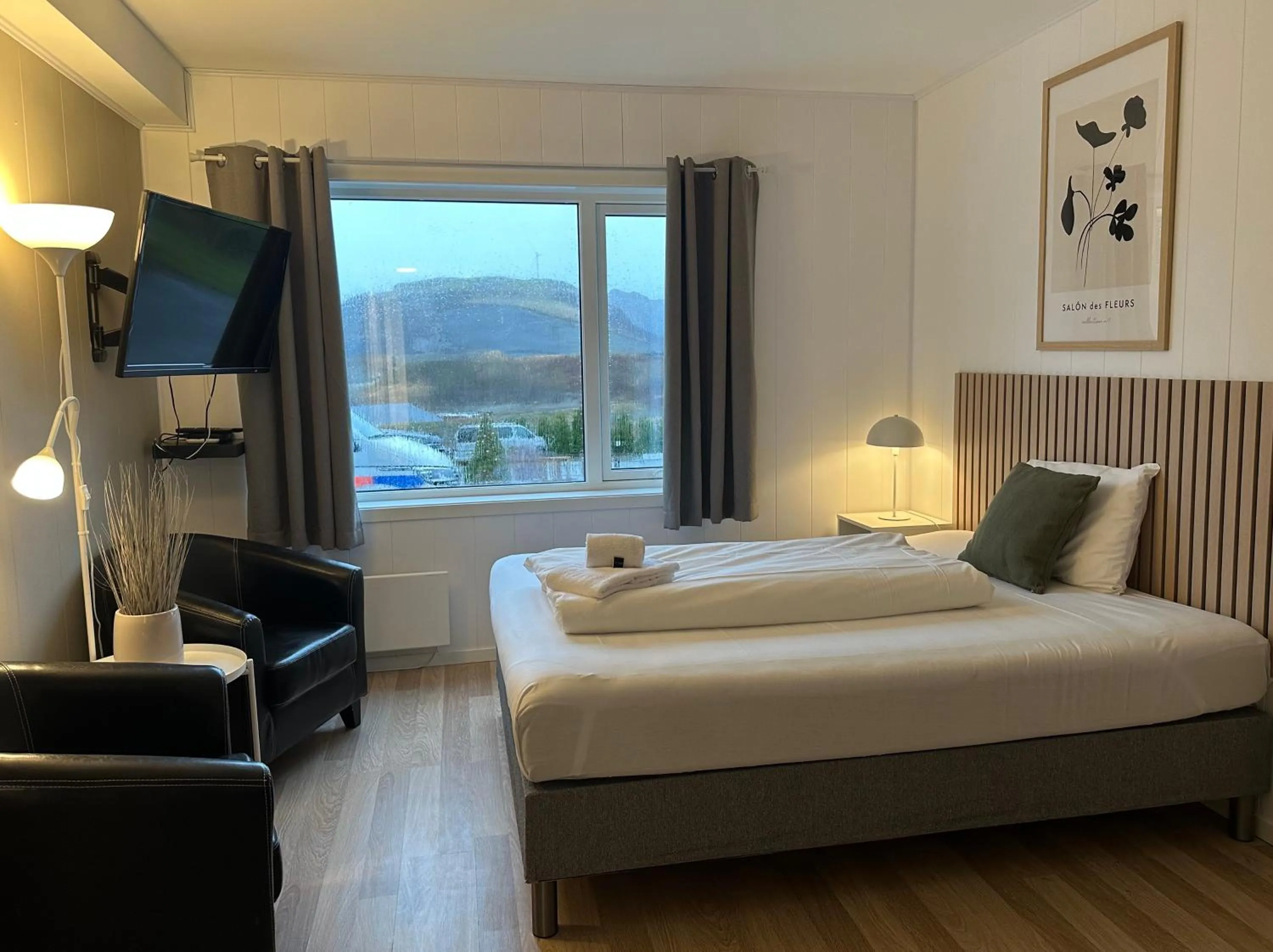 Bed in Selvbetjent leilighetshotell på Ålgård