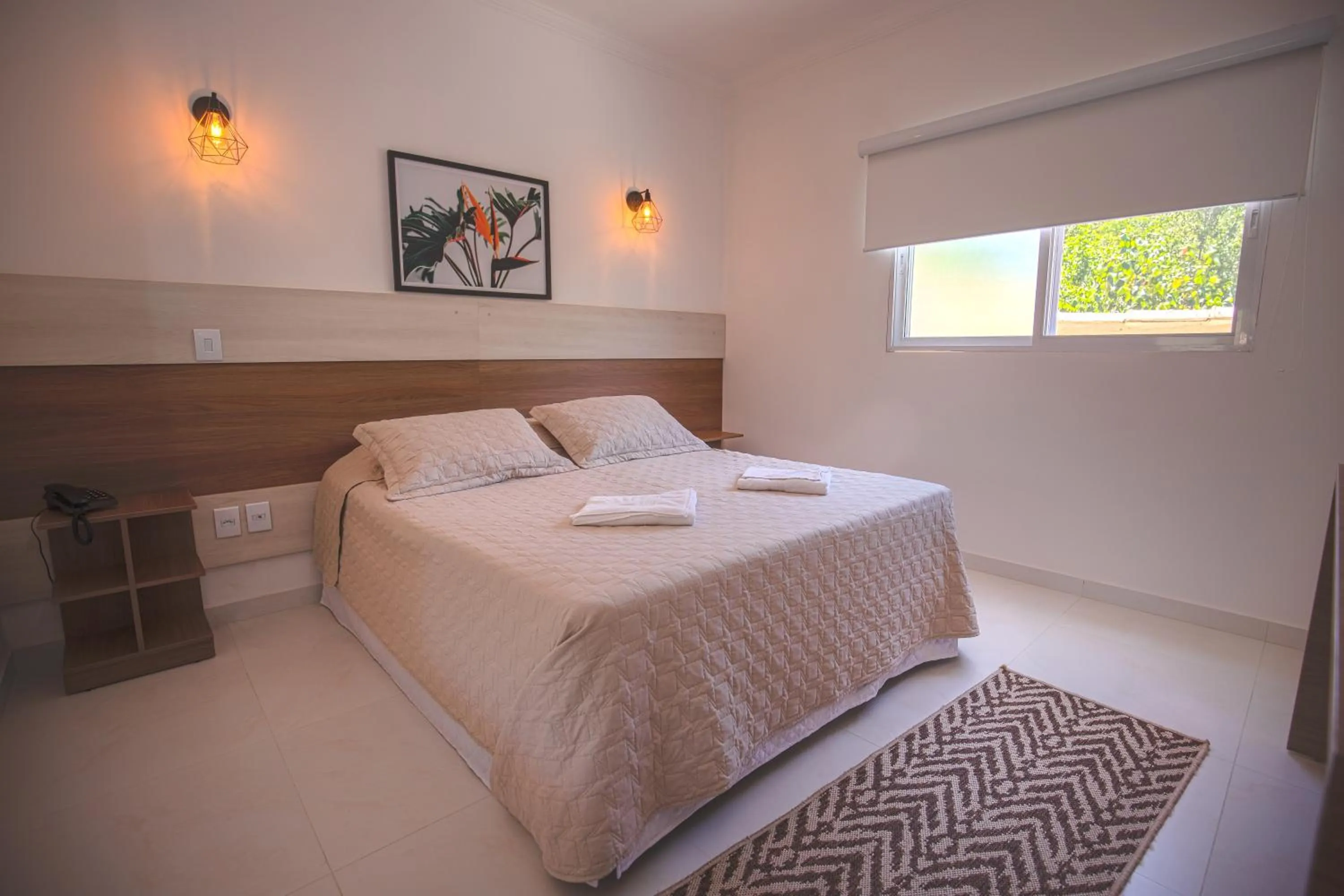 Bed in Pousada Recanto Jota Ge