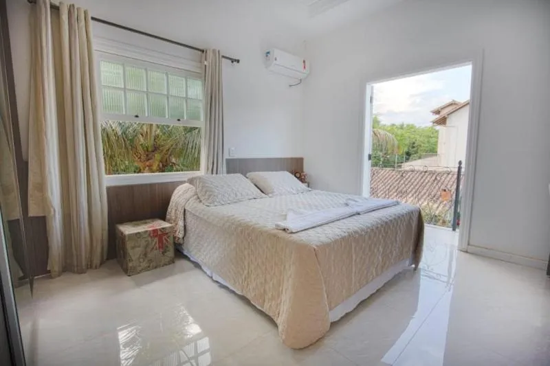 Bed in Pousada Recanto Jota Ge