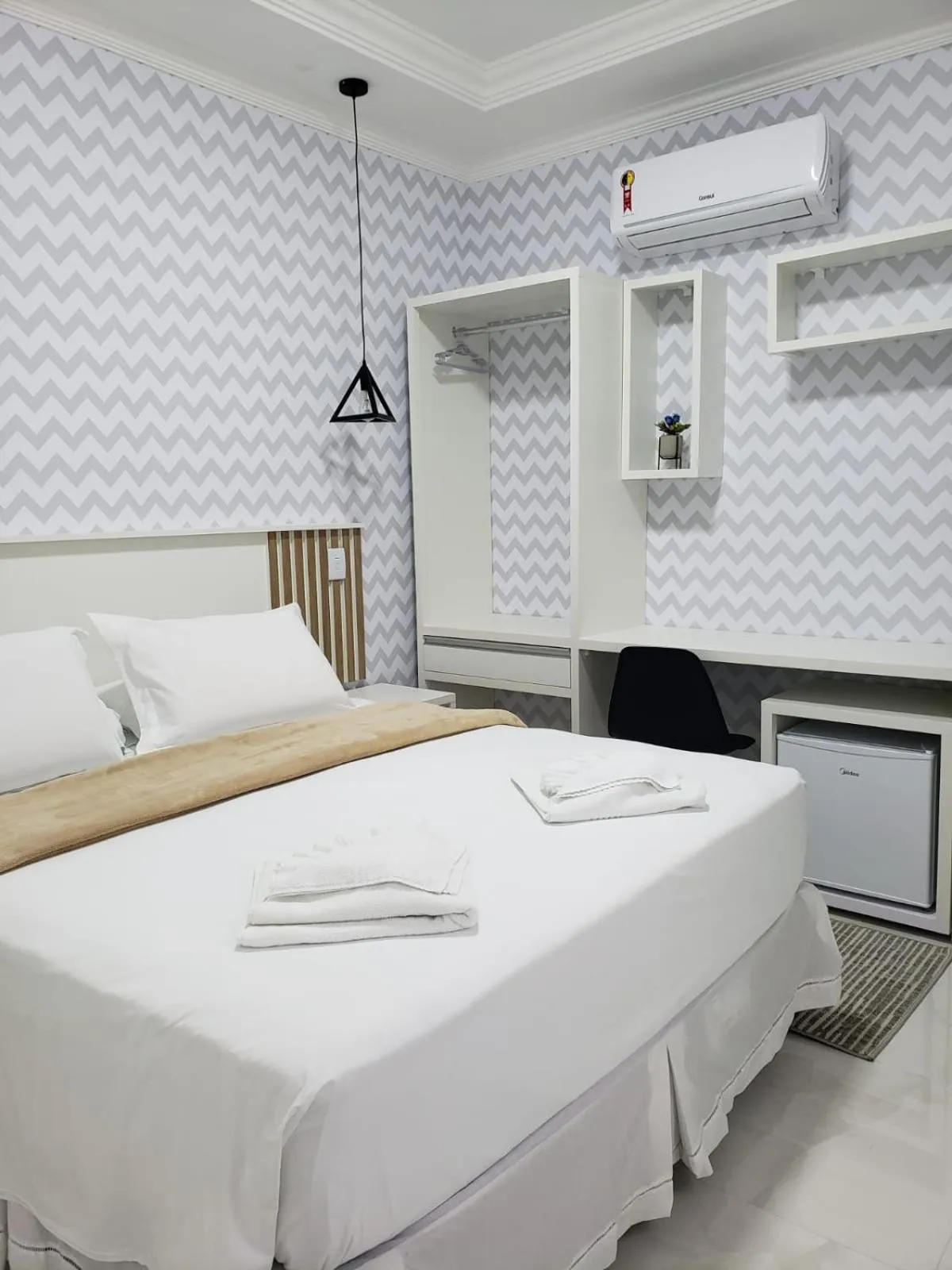 Bed in Pousada Recanto Jota Ge