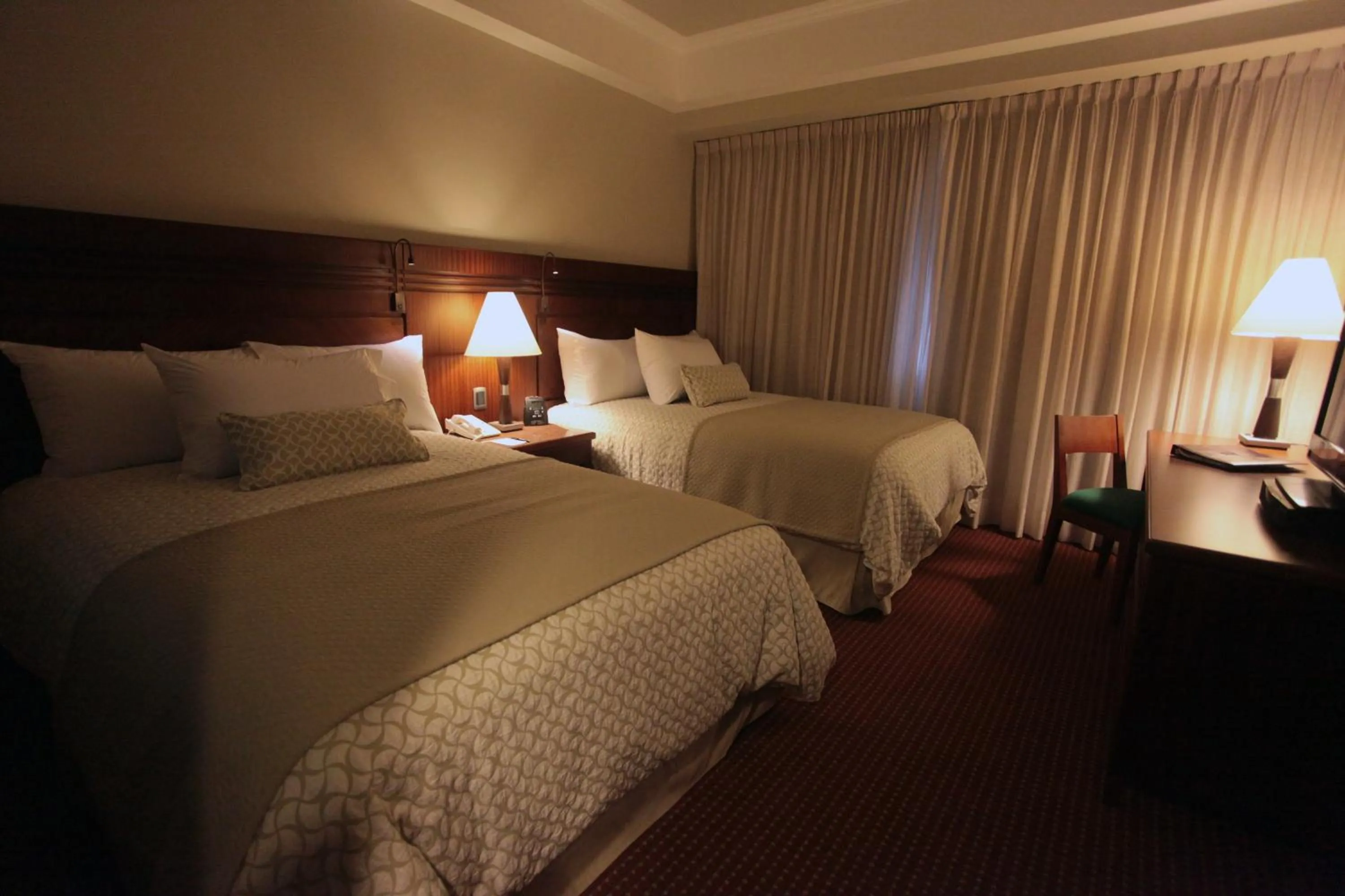 Bedroom, Bed in EXECUTIVE SUITES VALENCIA-Venezuela