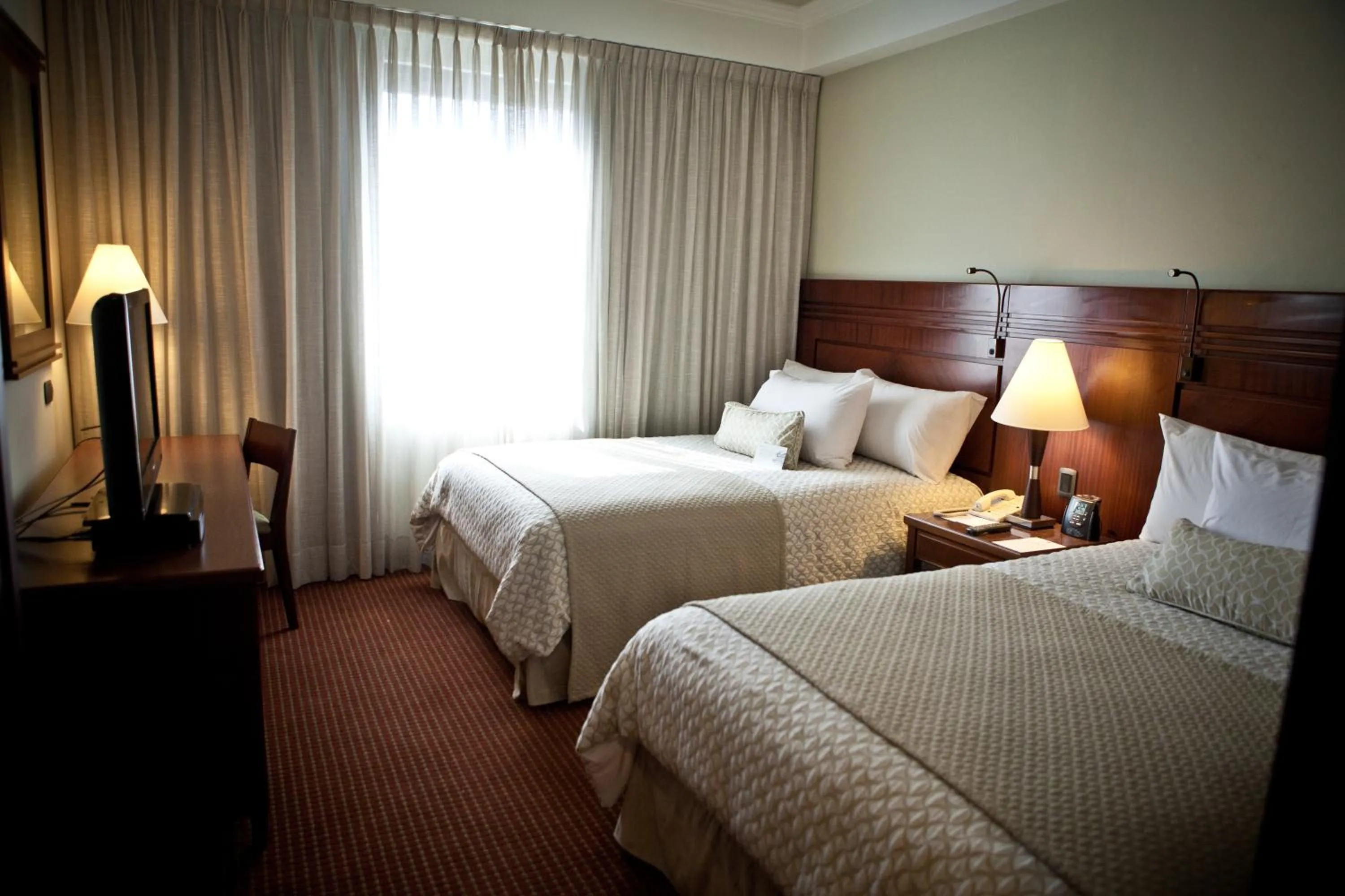 Bedroom, Bed in EXECUTIVE SUITES VALENCIA-Venezuela