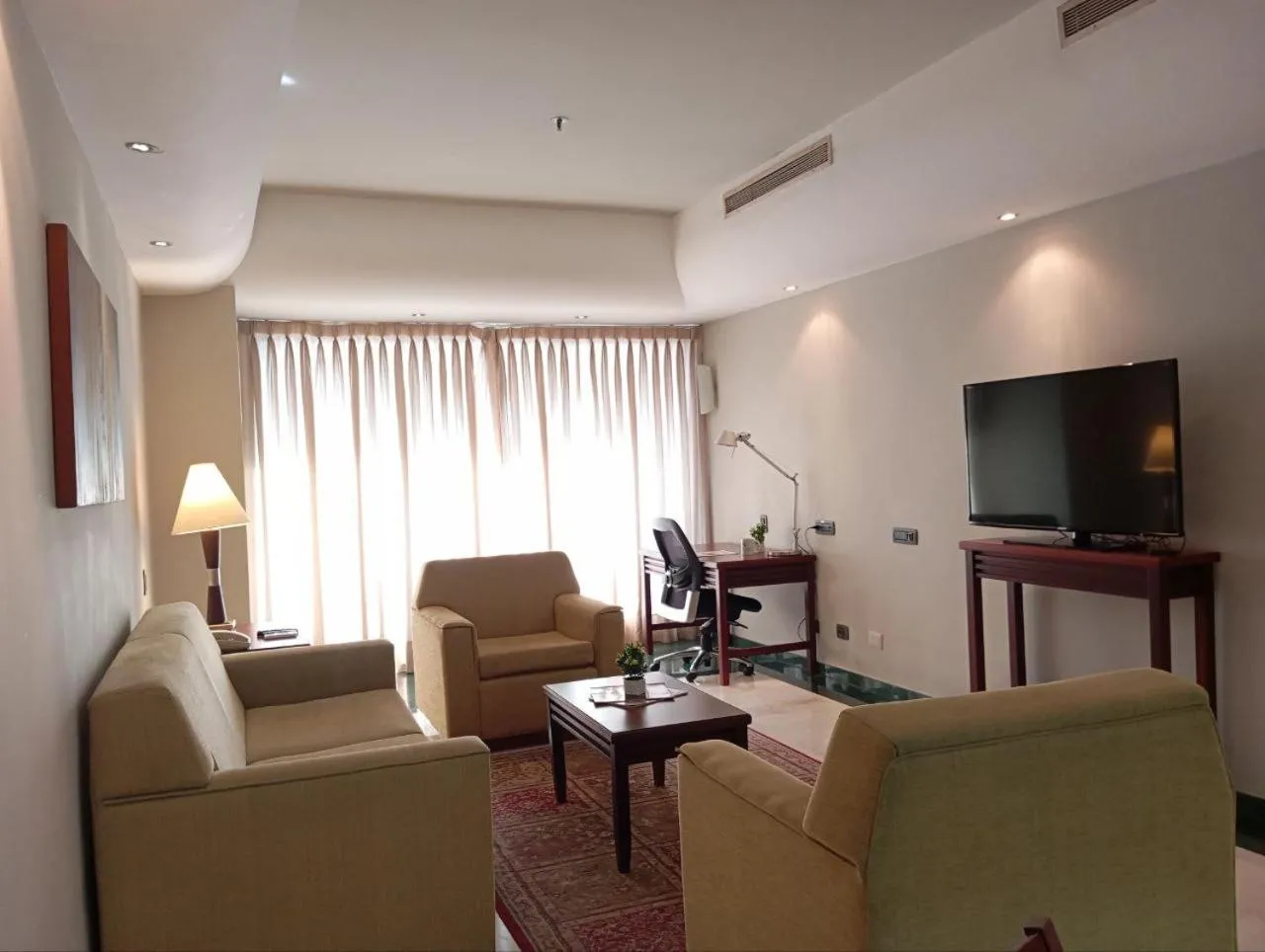 Living room in EXECUTIVE SUITES VALENCIA-Venezuela