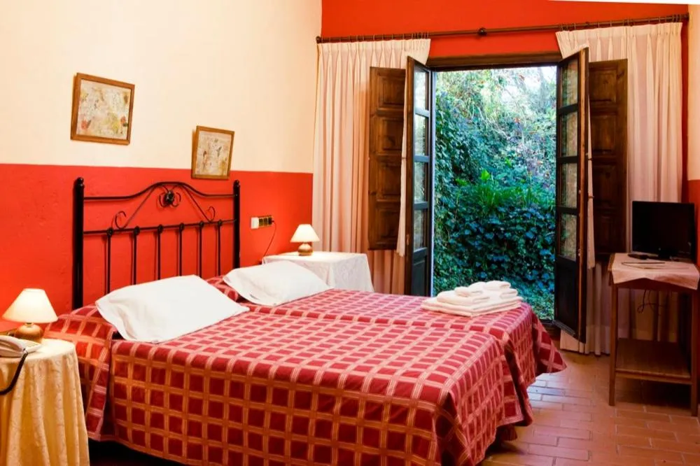 Bed in Hotel Rural La Llosa de Fombona