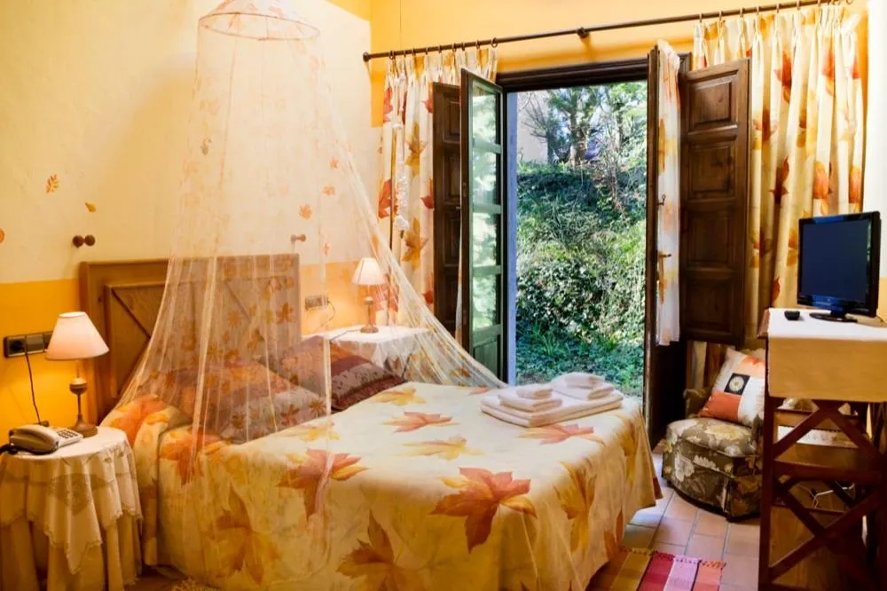 Bed in Hotel Rural La Llosa de Fombona