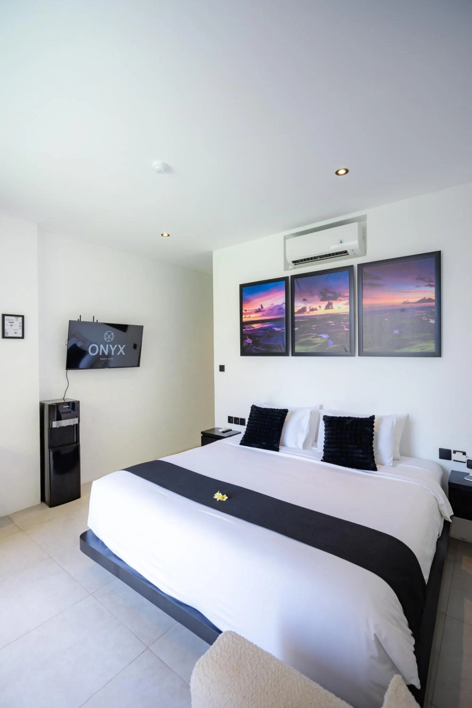 Bed in Onyx Beach Hotel