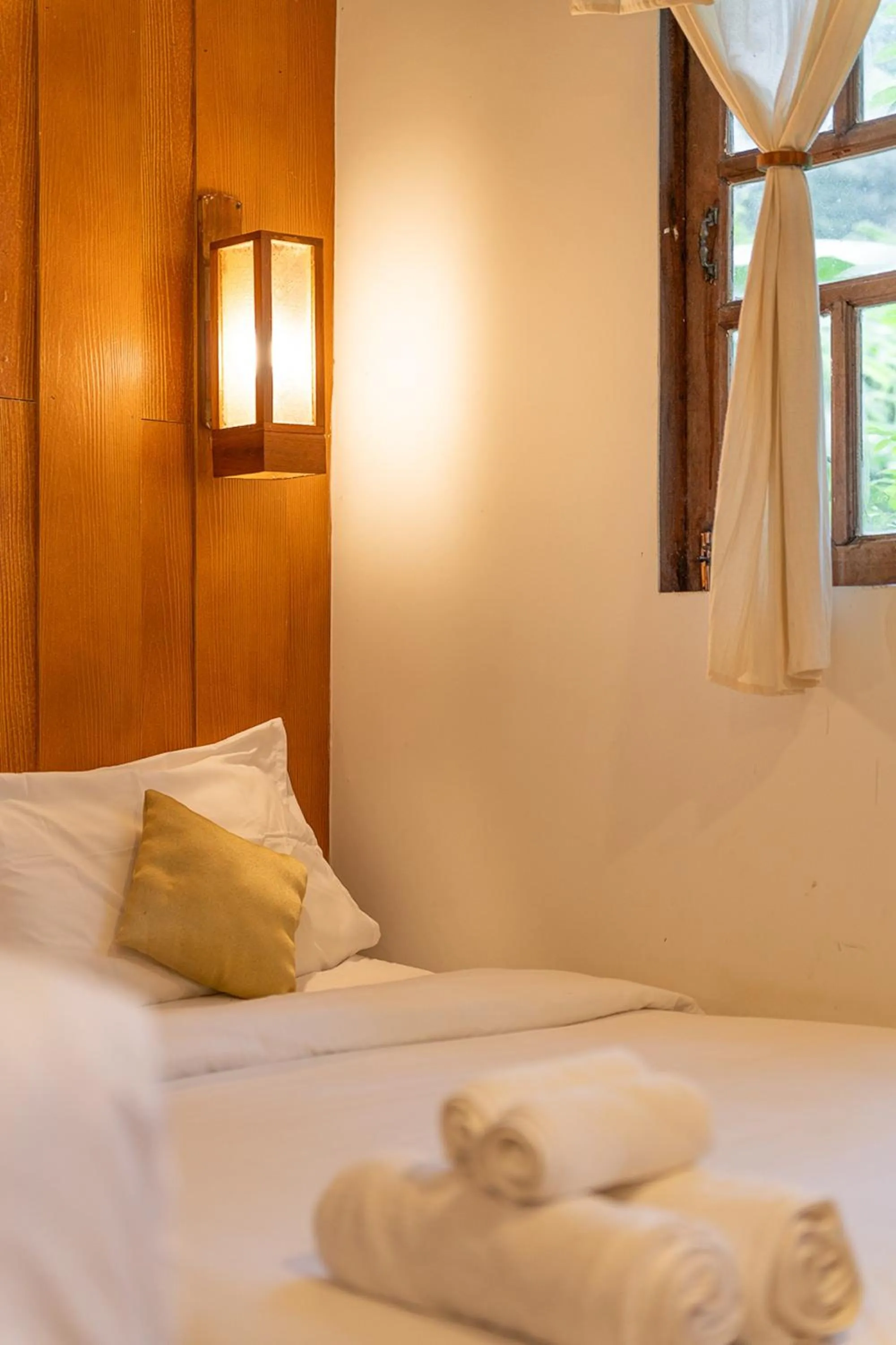 Bed in Monruamsuk Homestay Cafe and Bistro