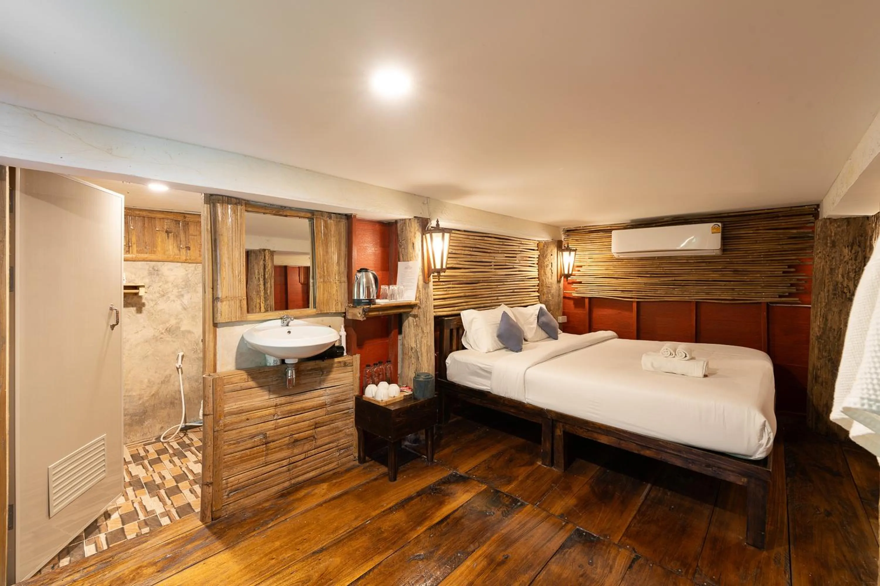 Bed in Monruamsuk Homestay Cafe and Bistro