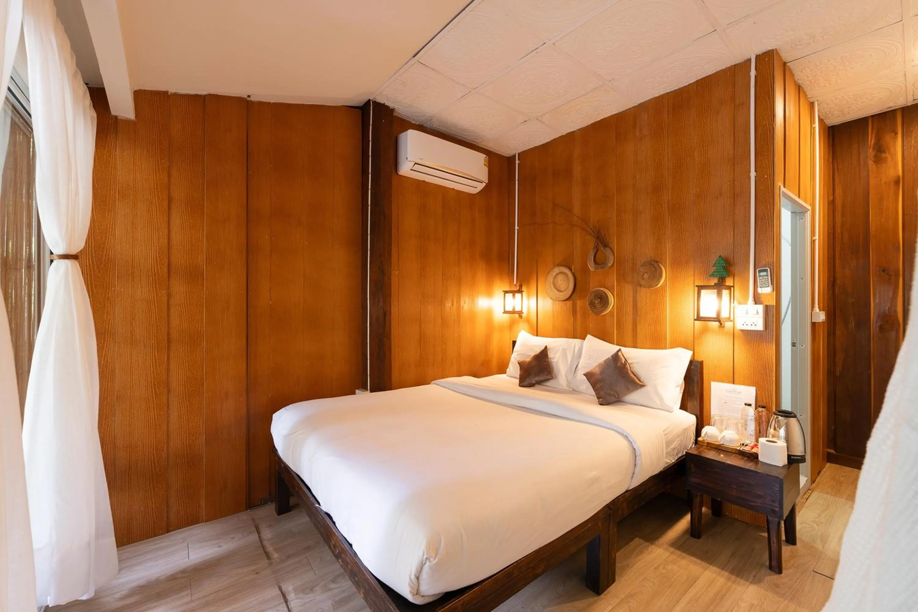 Bed in Monruamsuk Homestay Cafe and Bistro