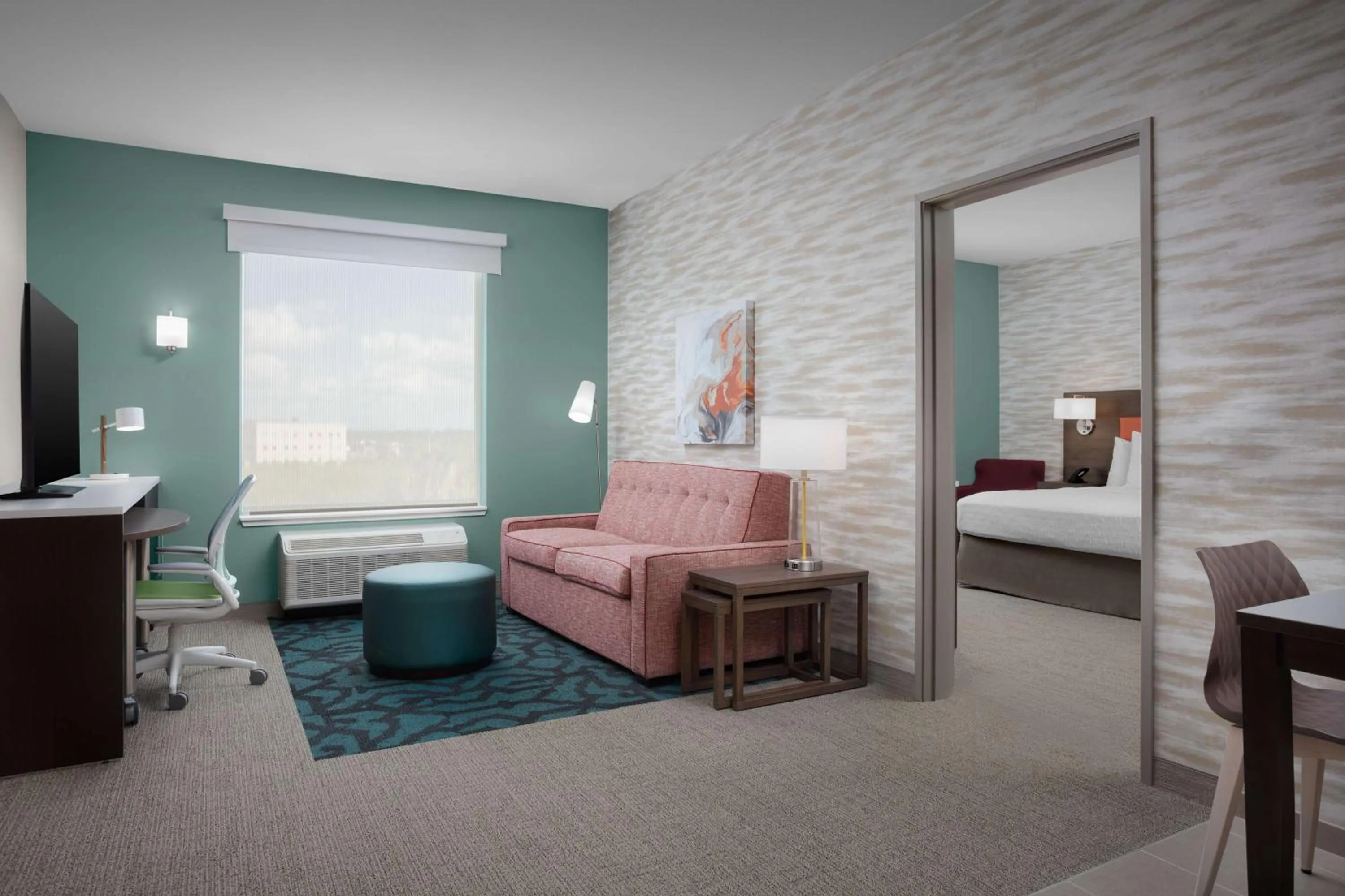 Living room, Bed in Home2 Suites By Hilton Laredo North