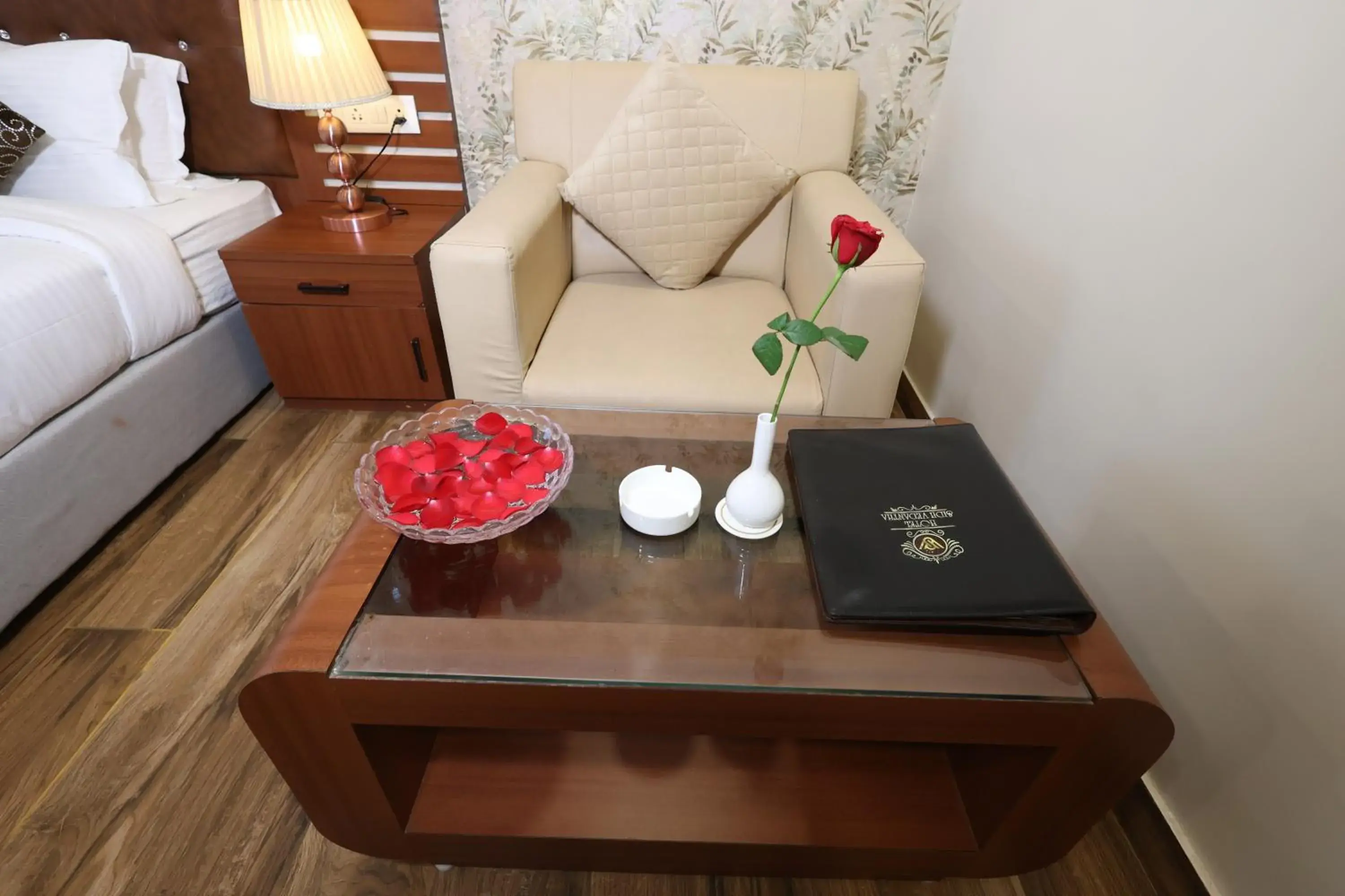 Seating area, Bed in Hotel Sidh Vedantha Seating area, Bed in Hotel Sidh Vedantha