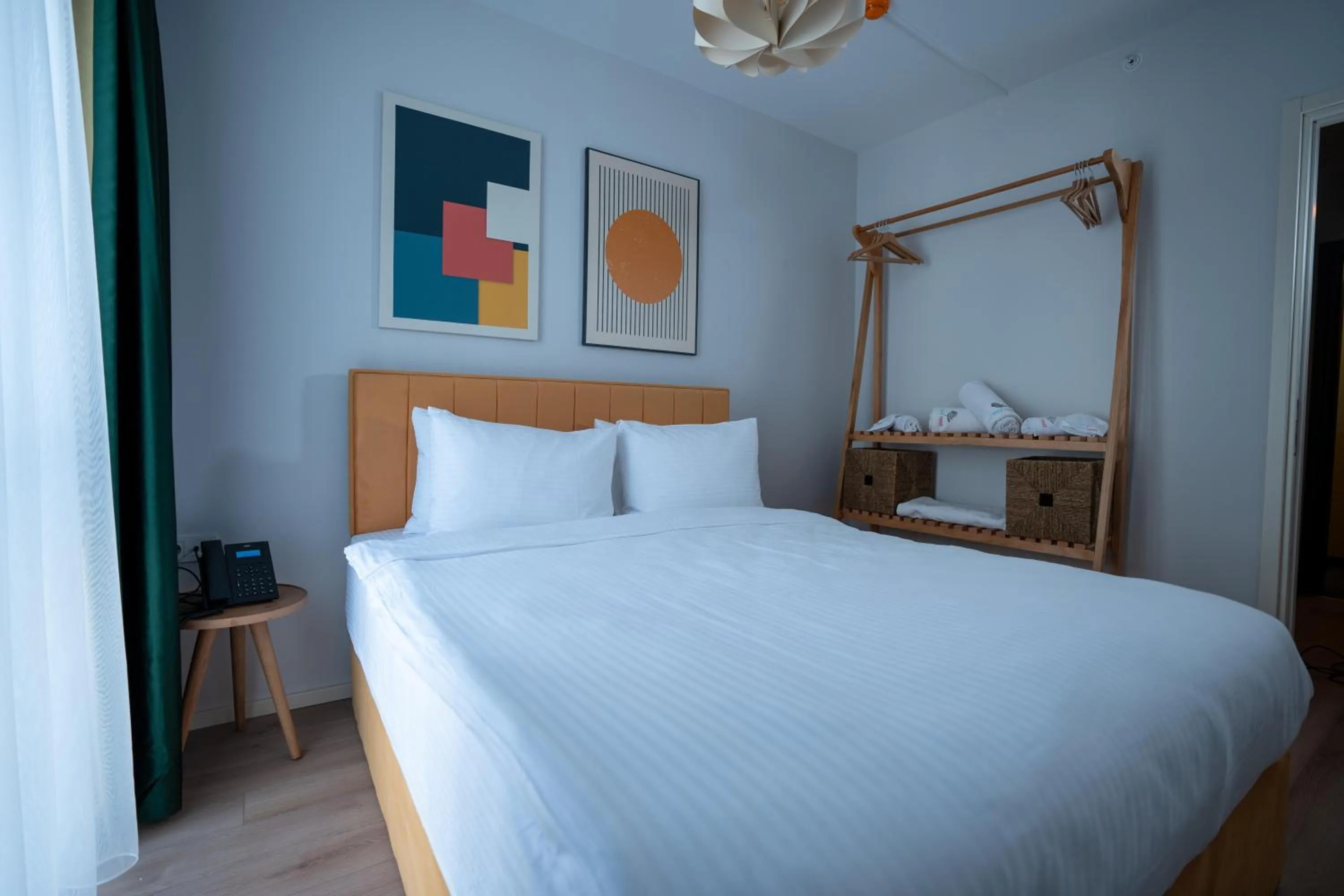 Photo of the whole room, Bed in Bird Nest Suites