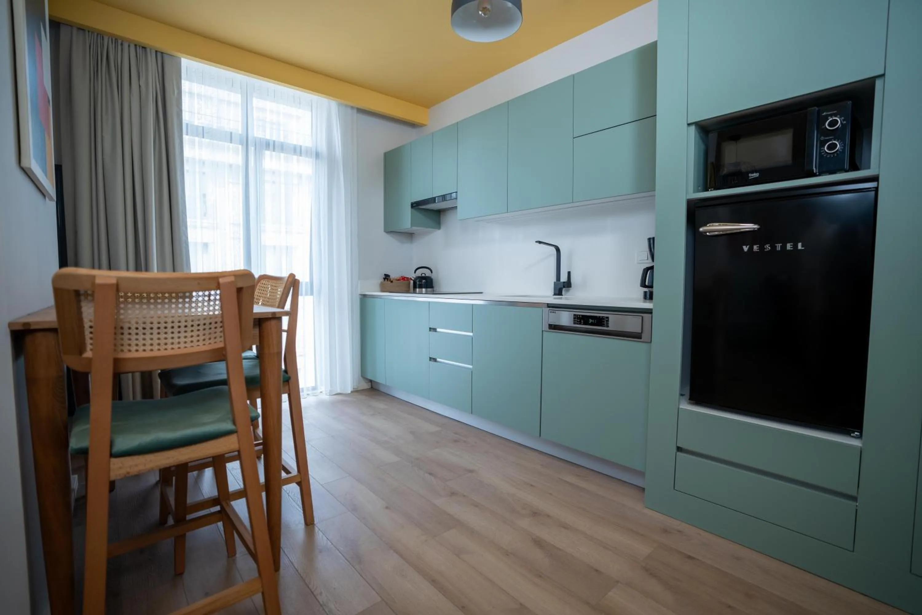 Kitchen or kitchenette in Bird Nest Suites