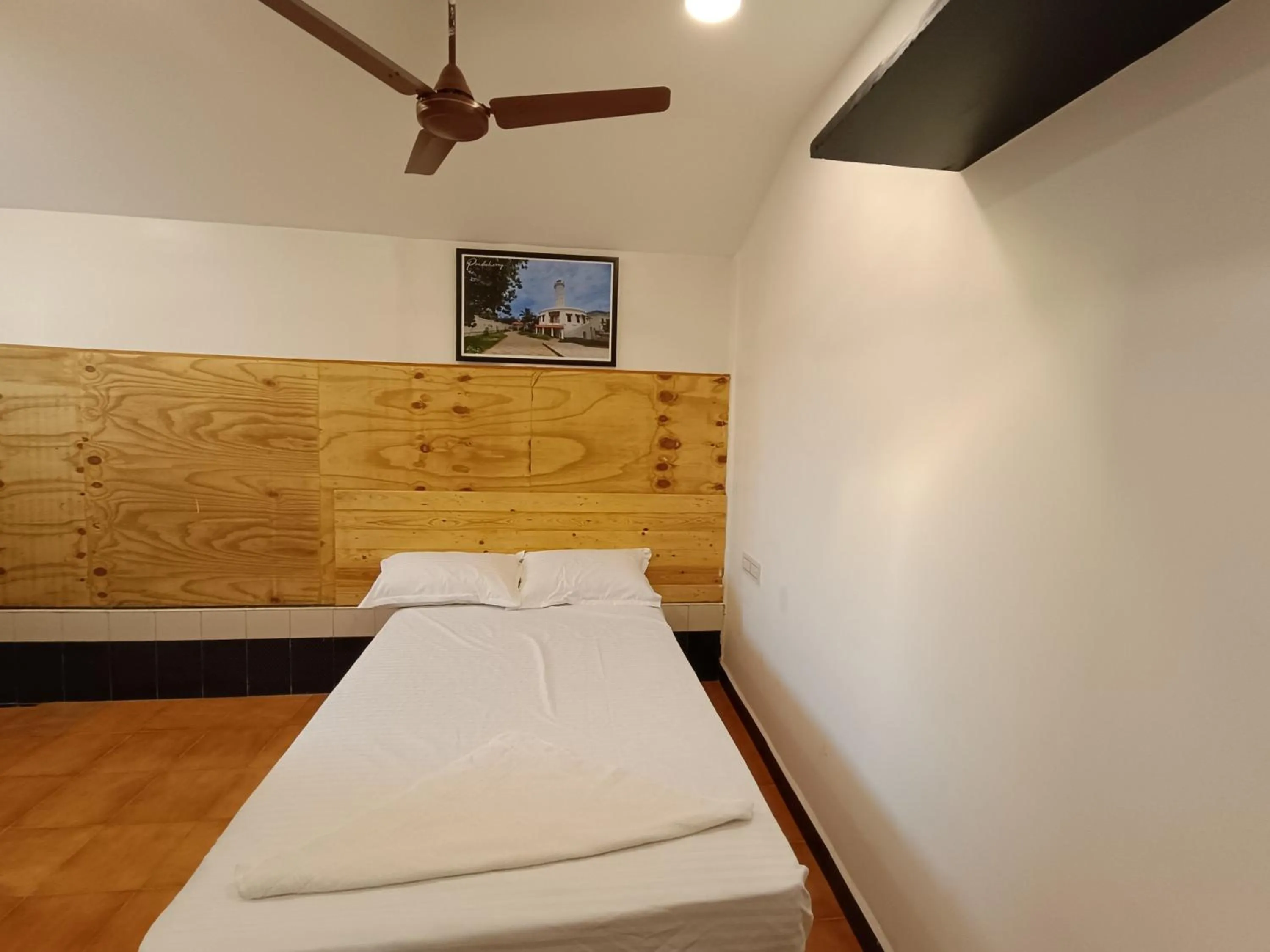 Bed in Arul Residency