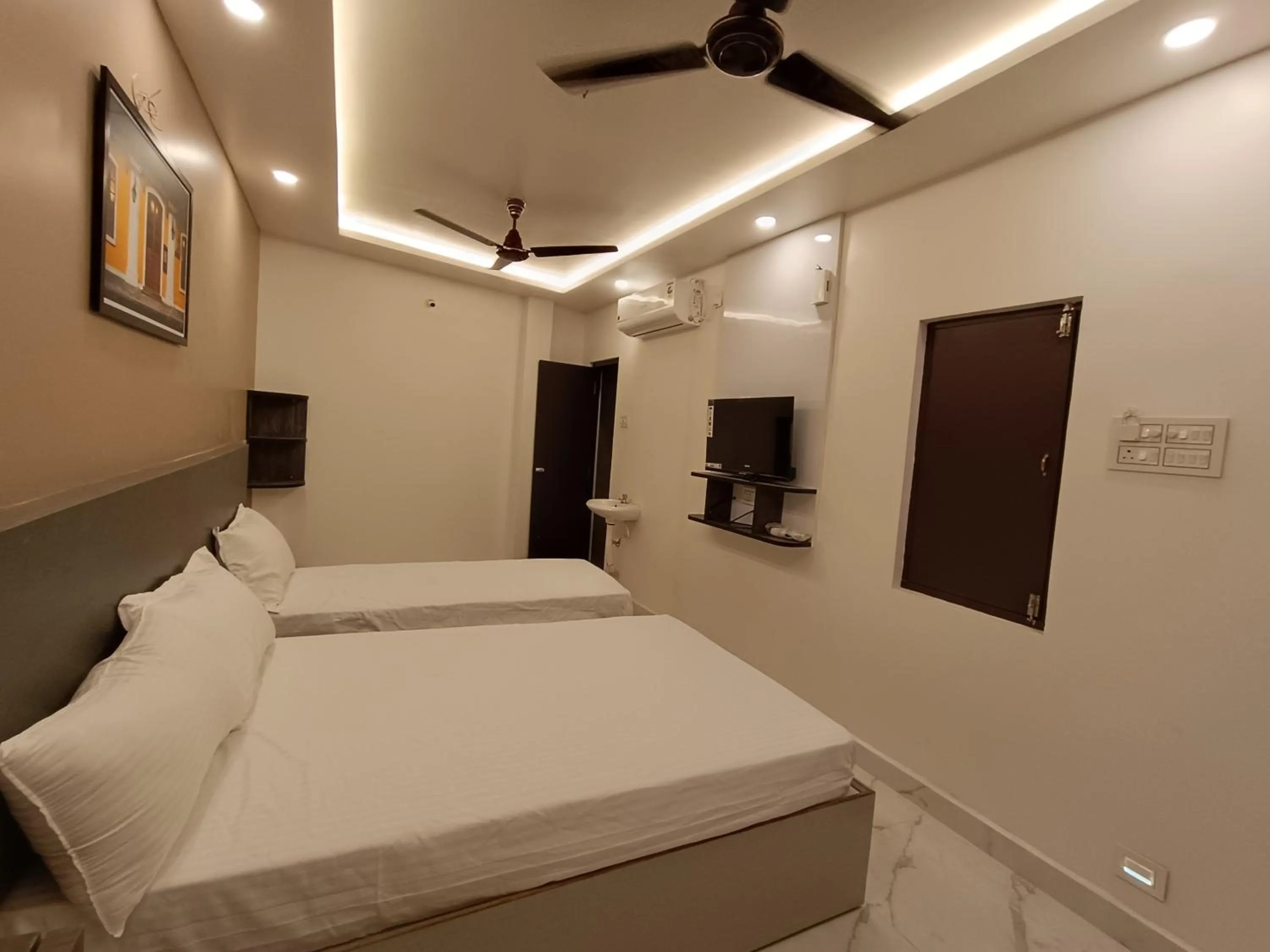 Bed in Arul Residency