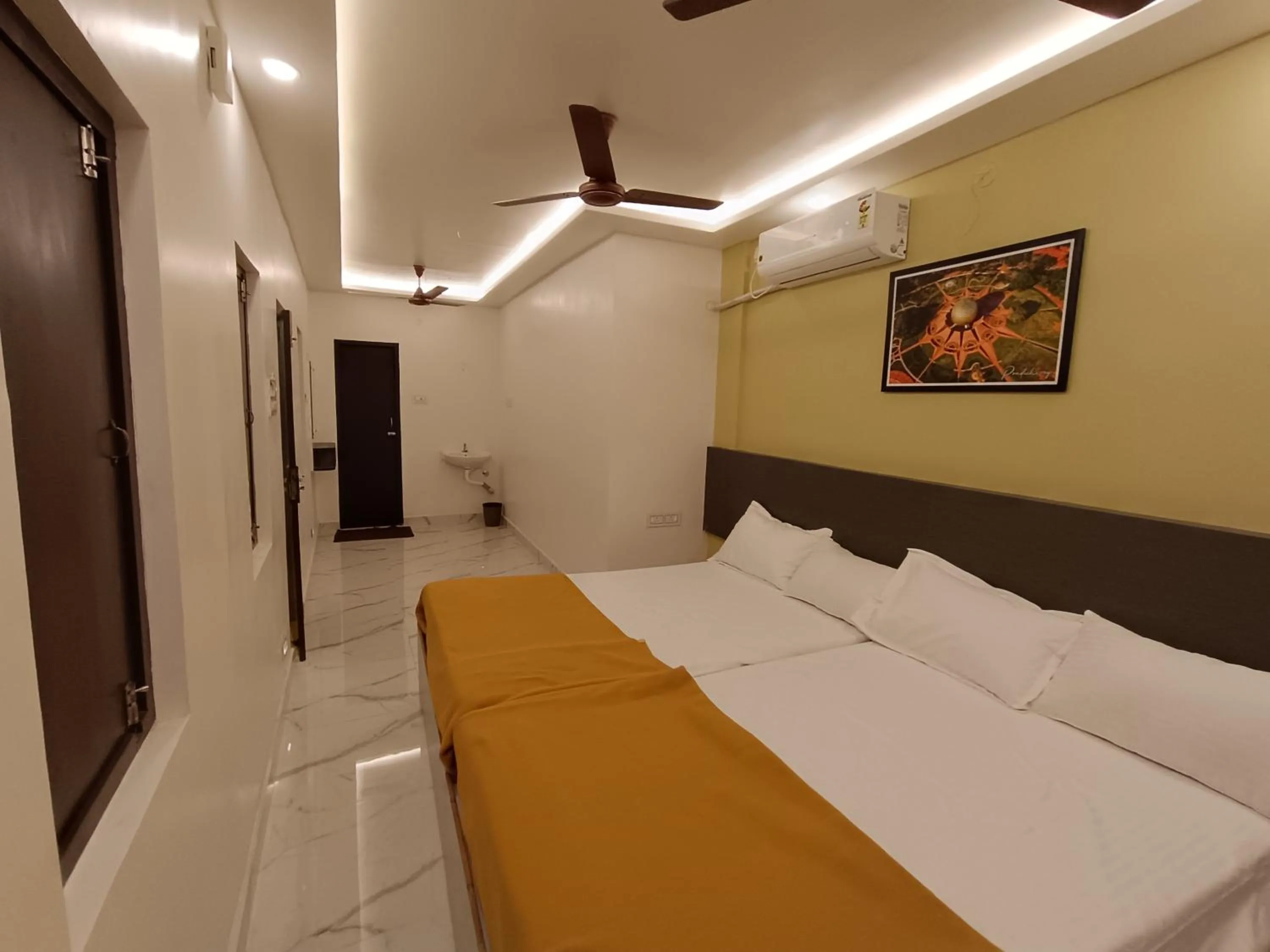 Bed in Arul Residency