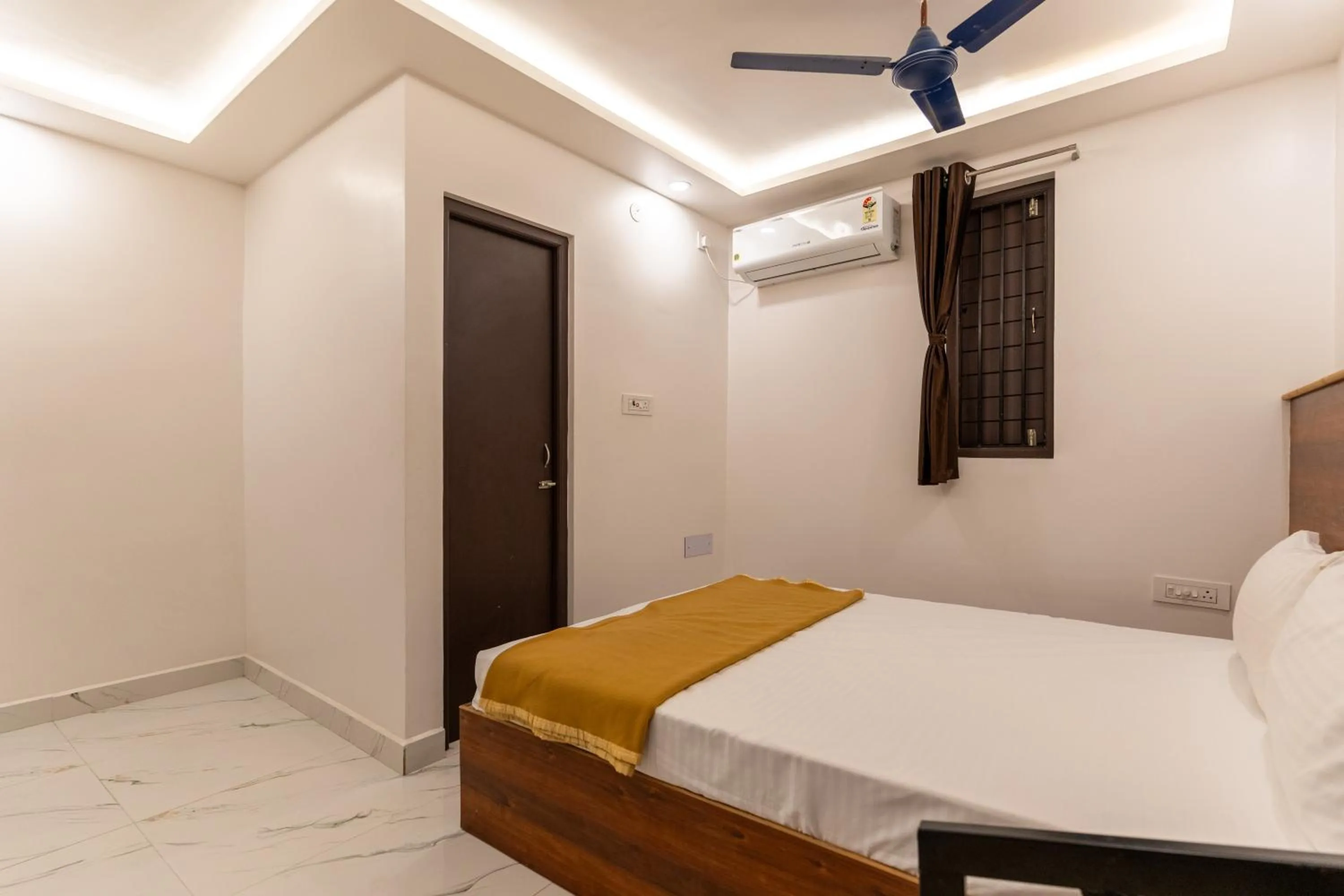 Bed in Arul Residency