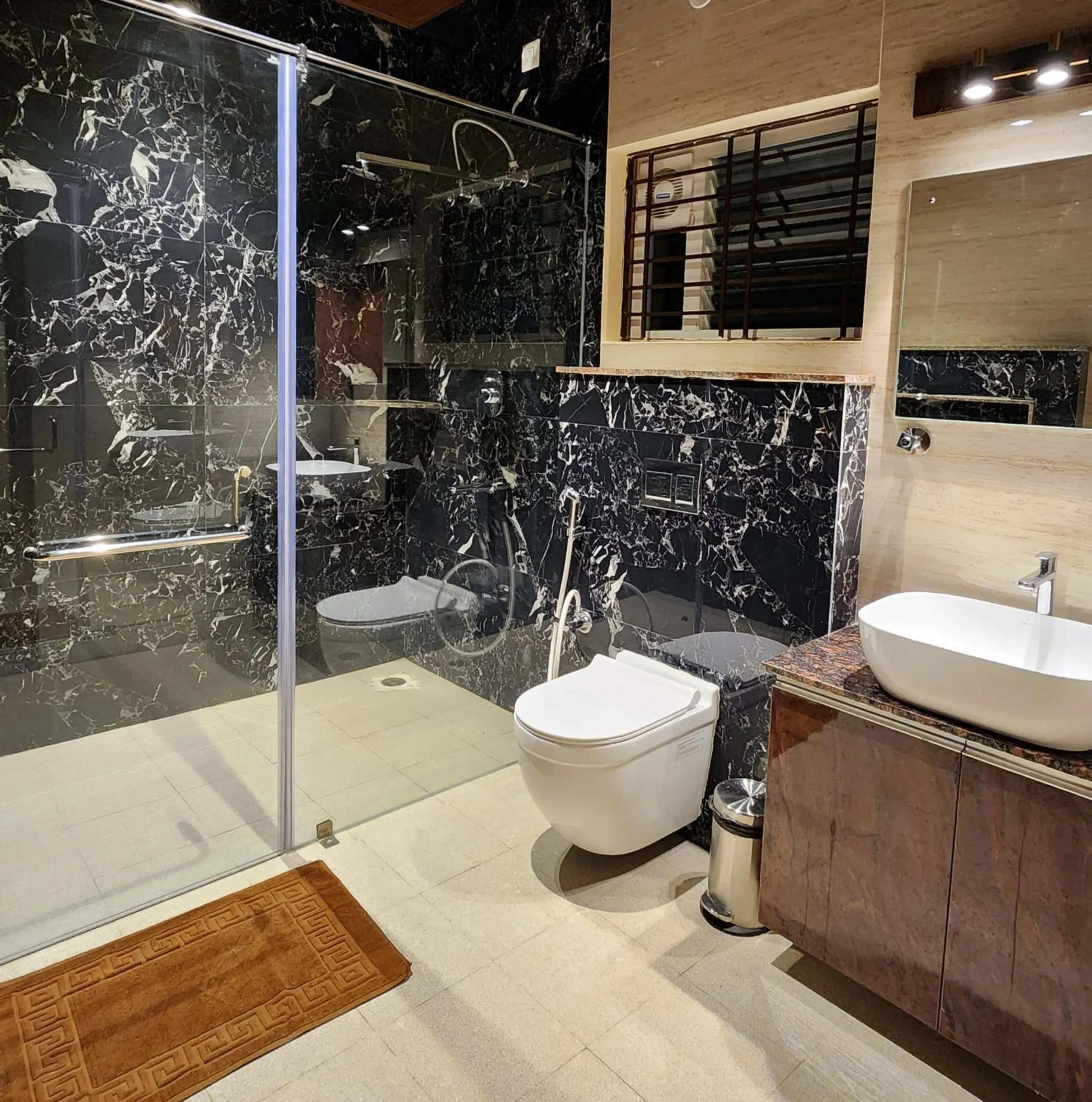 Shower in Poojaris Nirantara - Mysuru