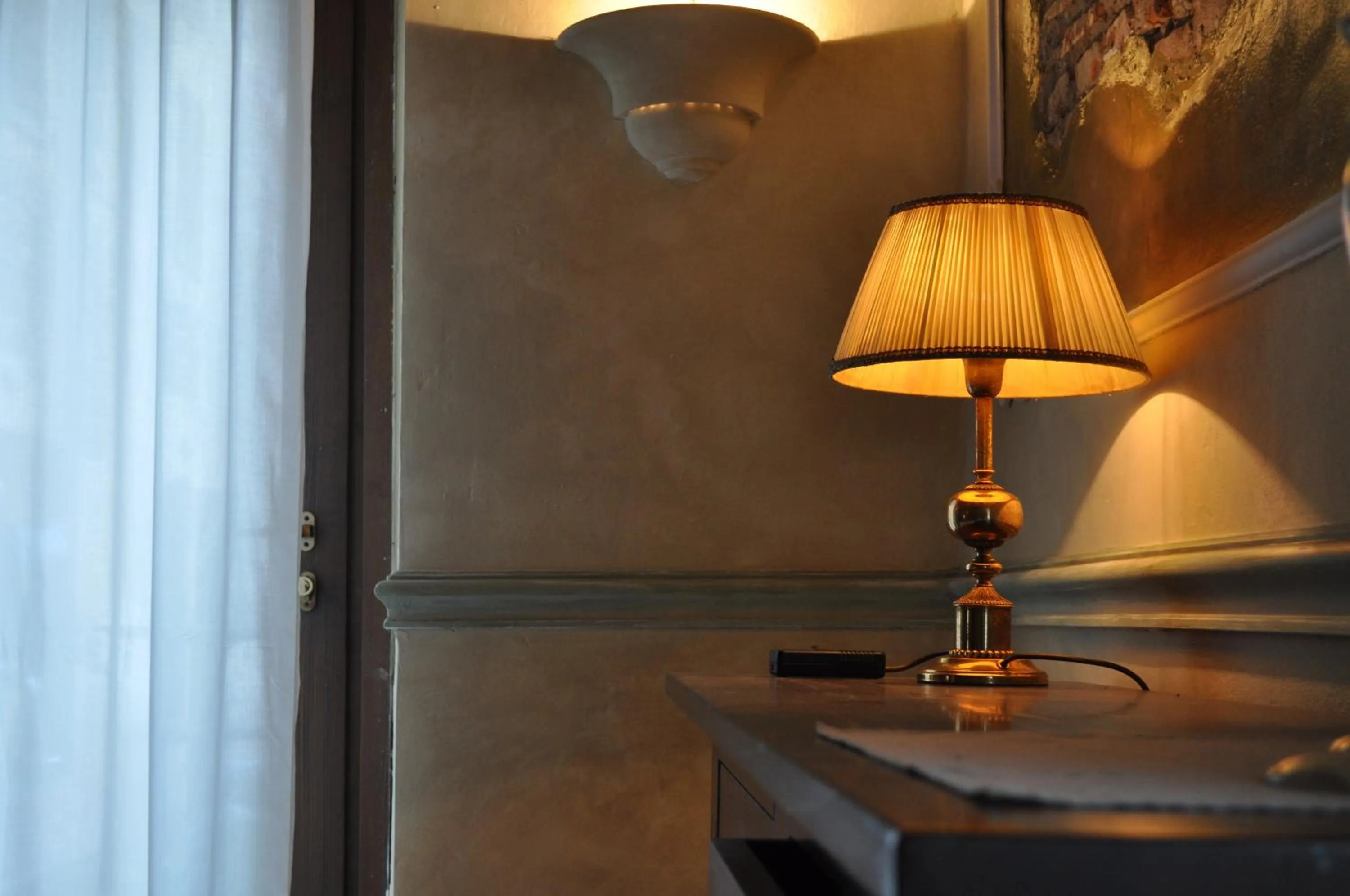 Communal lounge/ TV room in Le Residenze del Tenore