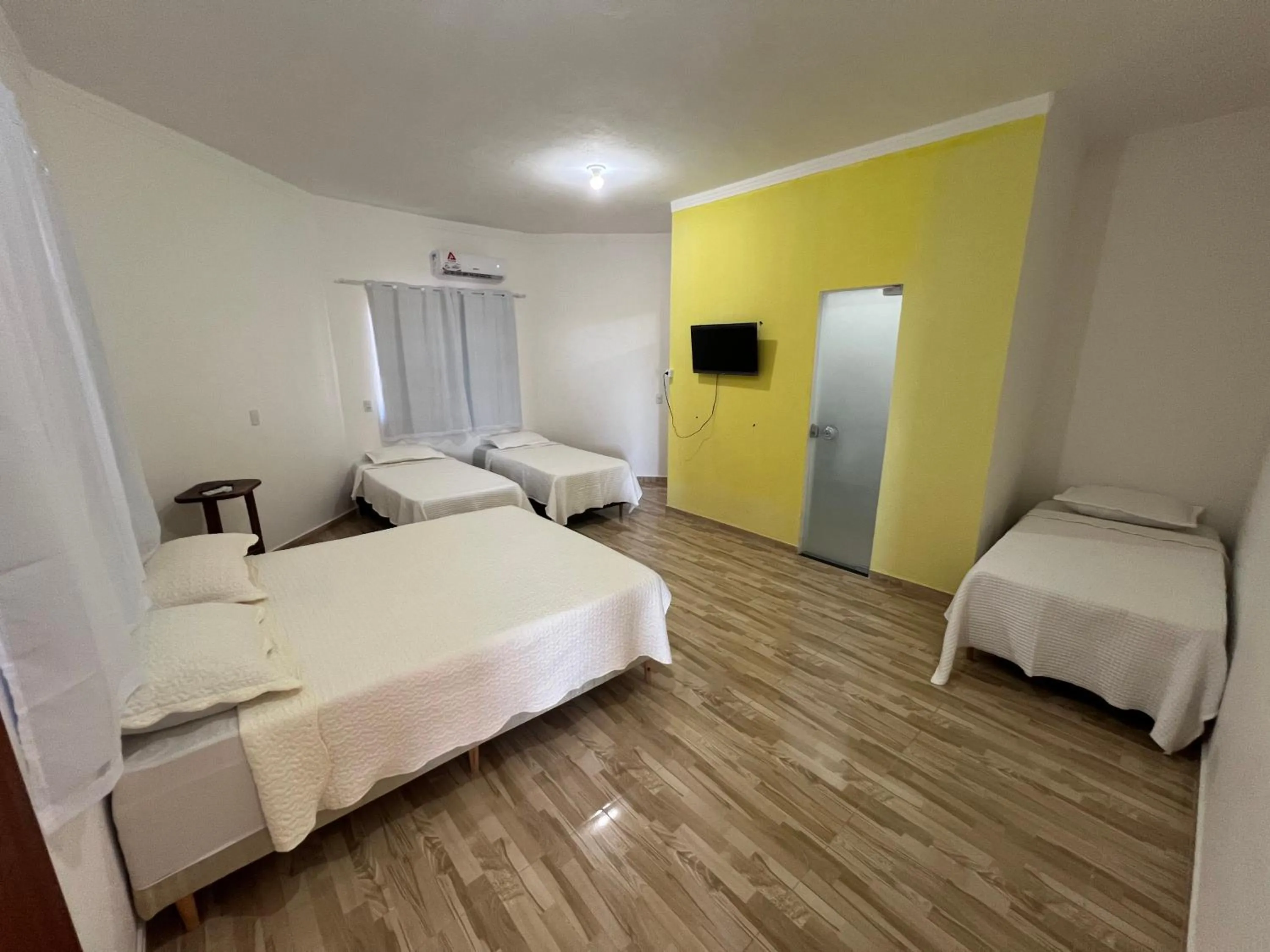 Bed in Pousada Recanto Vila Viçosa