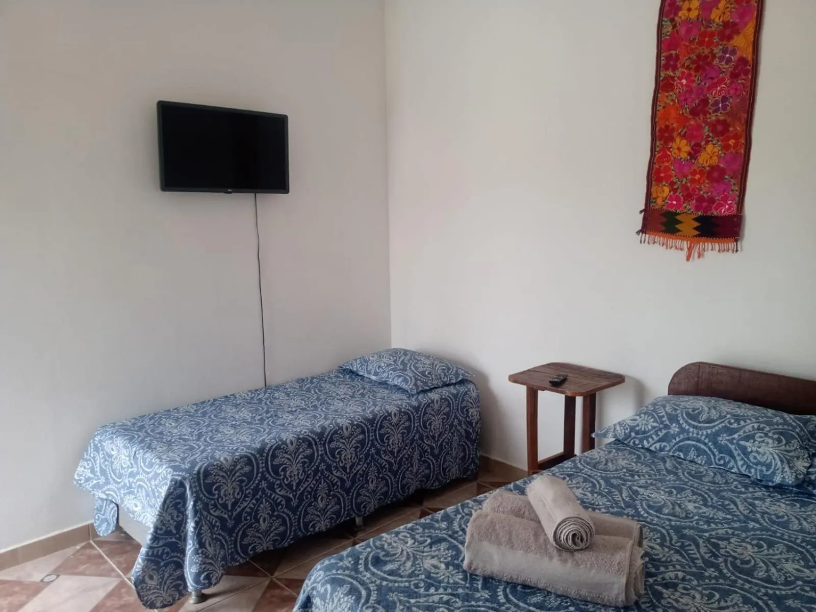 Bed in Pousada Recanto Vila Viçosa