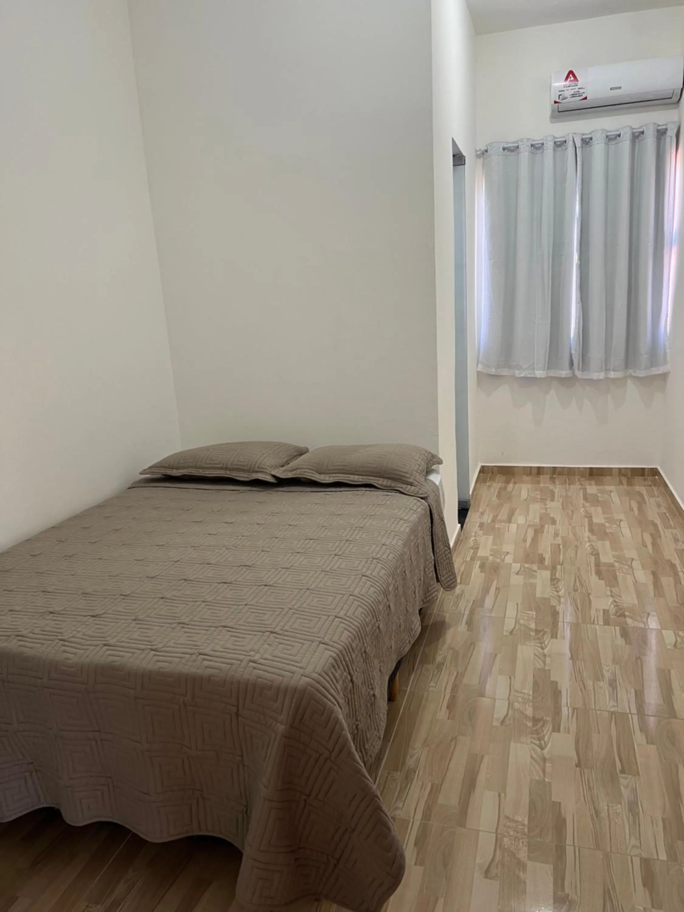Bed in Pousada Recanto Vila Viçosa
